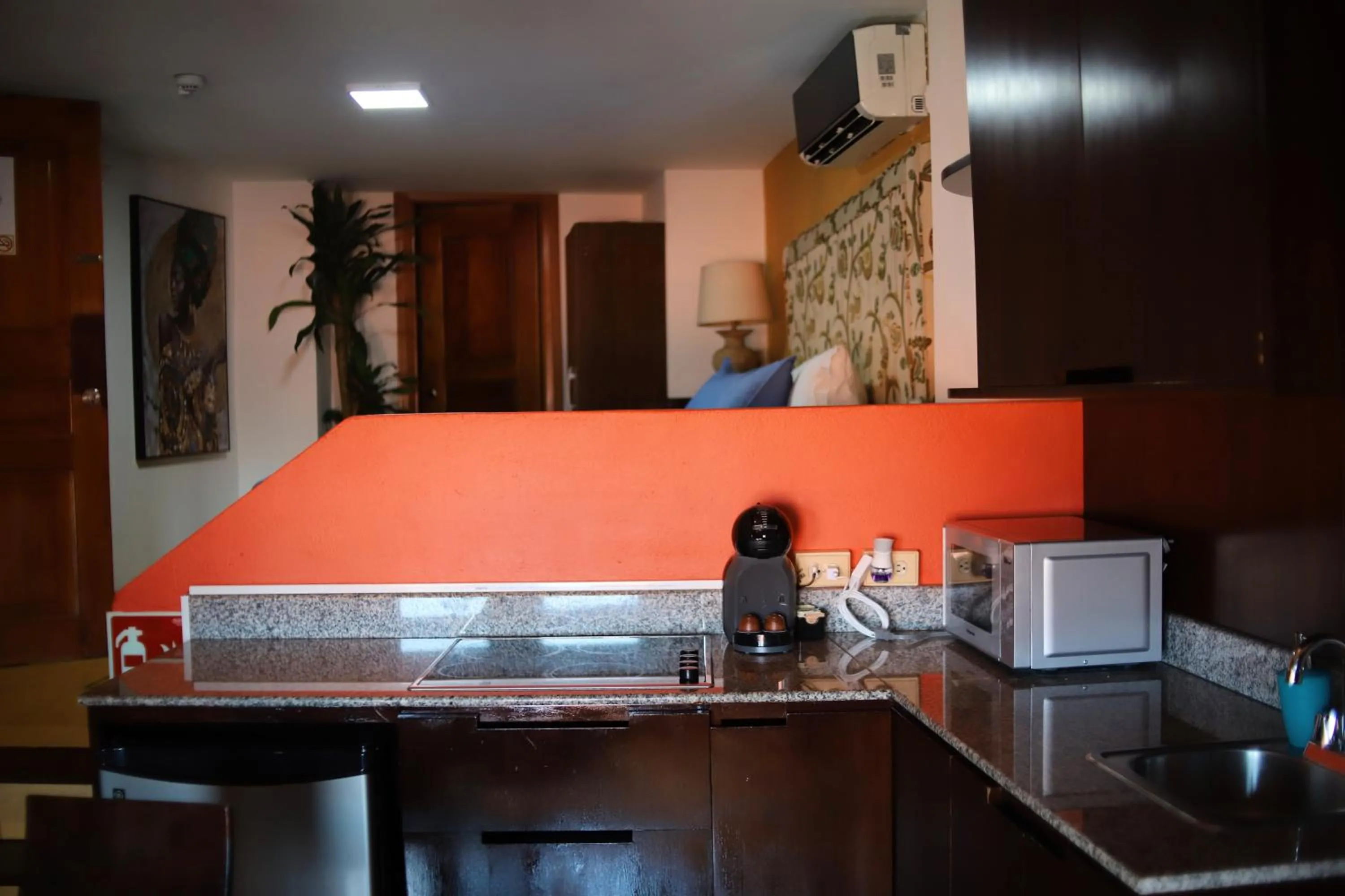 Kitchen or kitchenette in Oasis Hotel