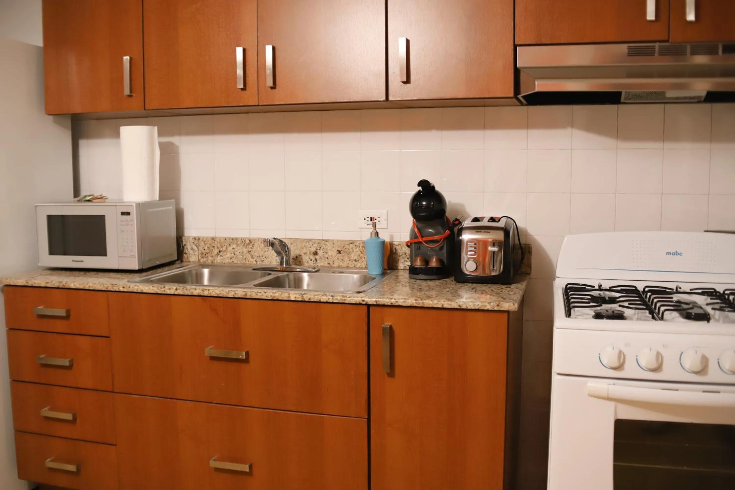 Kitchen or kitchenette in Oasis Hotel