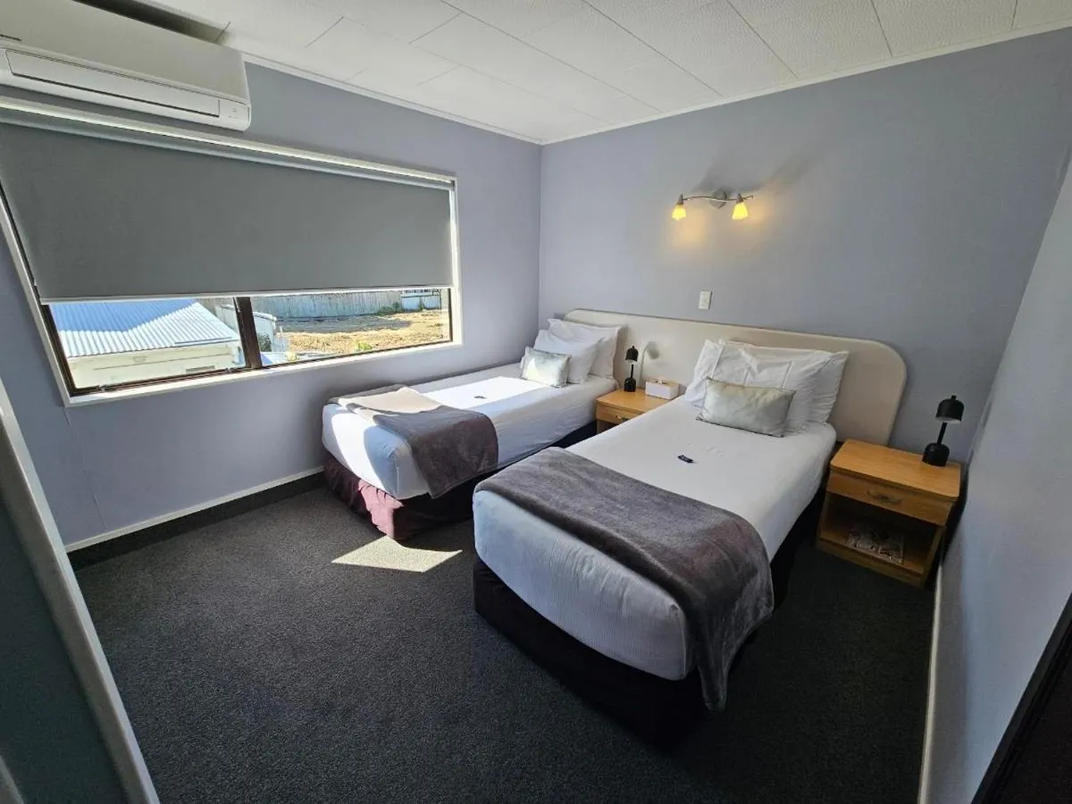 Bed in Hacienda Motor Lodge