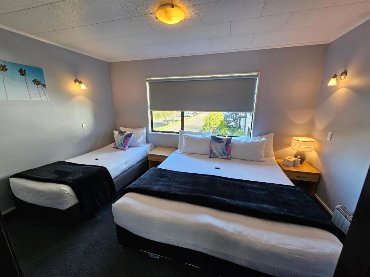 Bed in Hacienda Motor Lodge