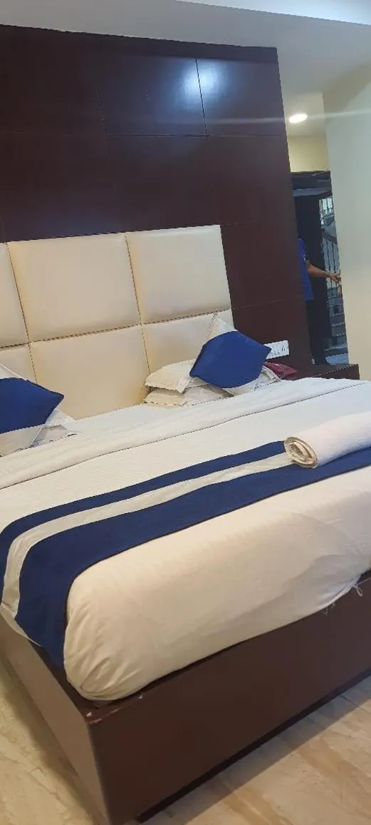 Bed in Hotel Presidency Inn