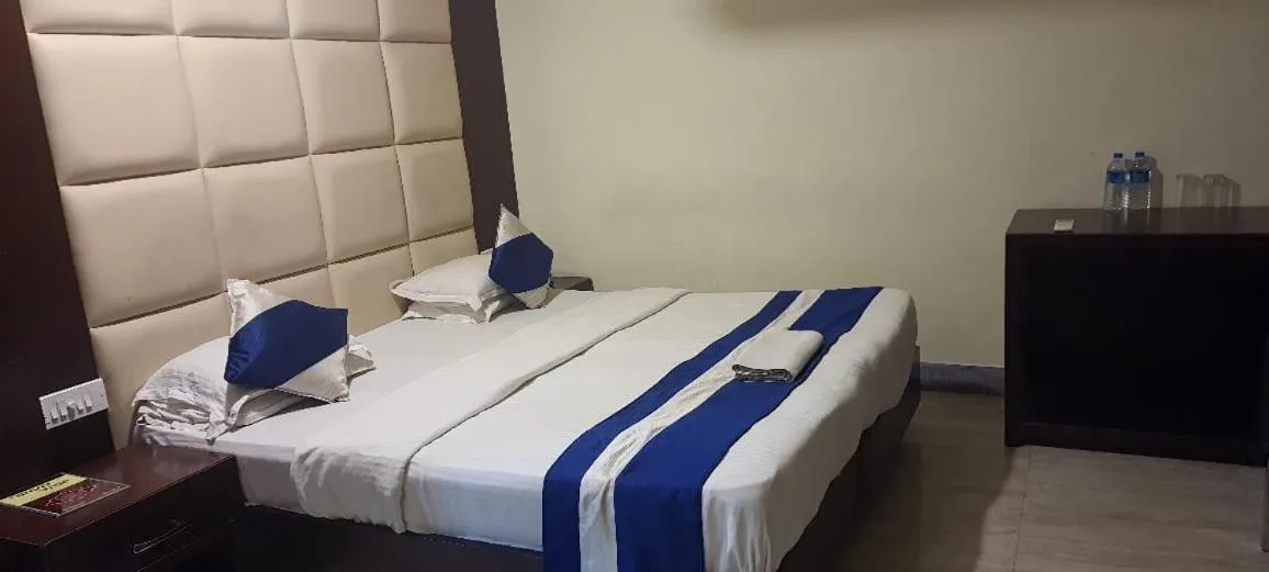 Bed in Hotel Presidency Inn