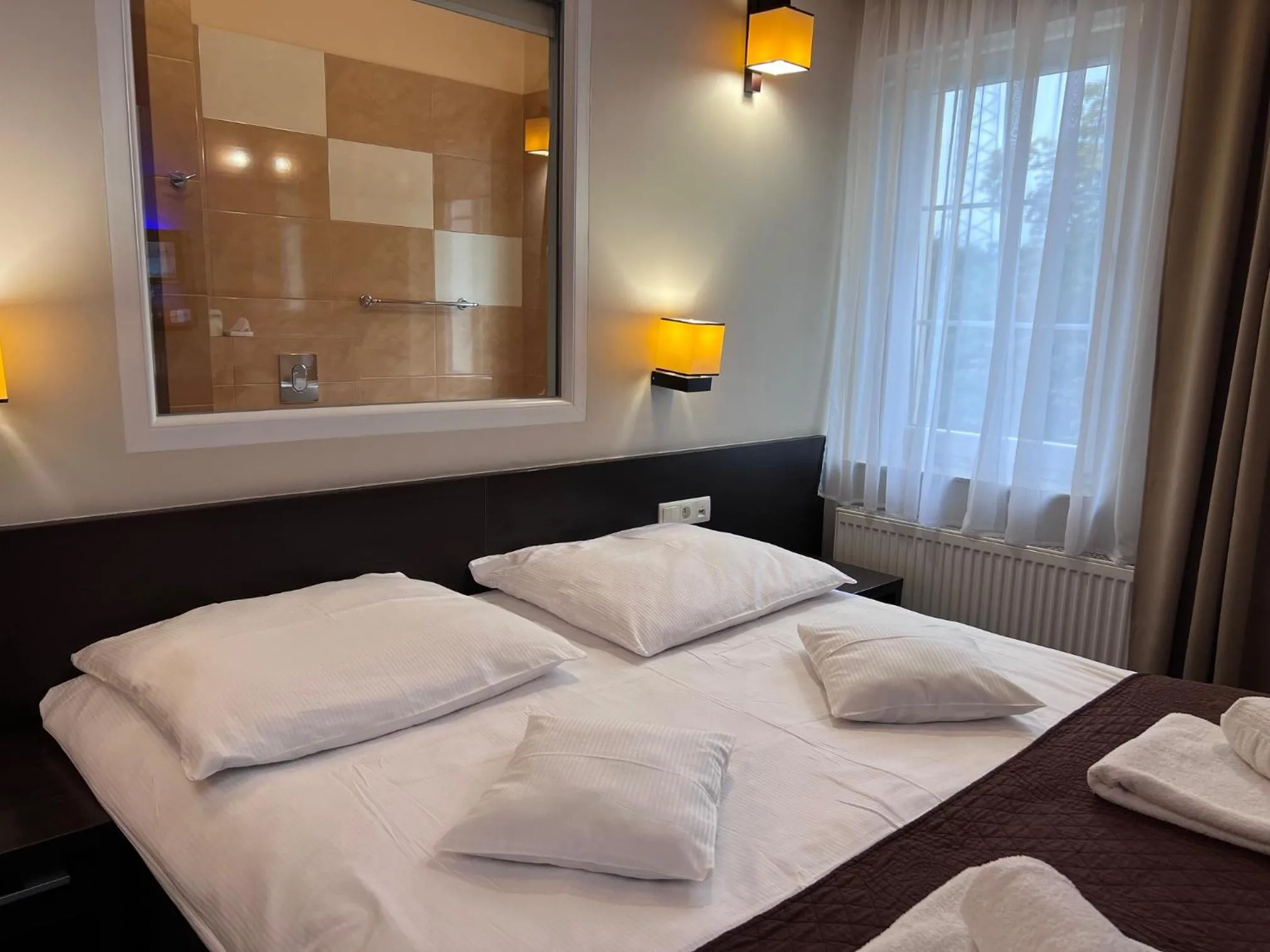Bed in Aura - Hotel & Restaurant & Sauna