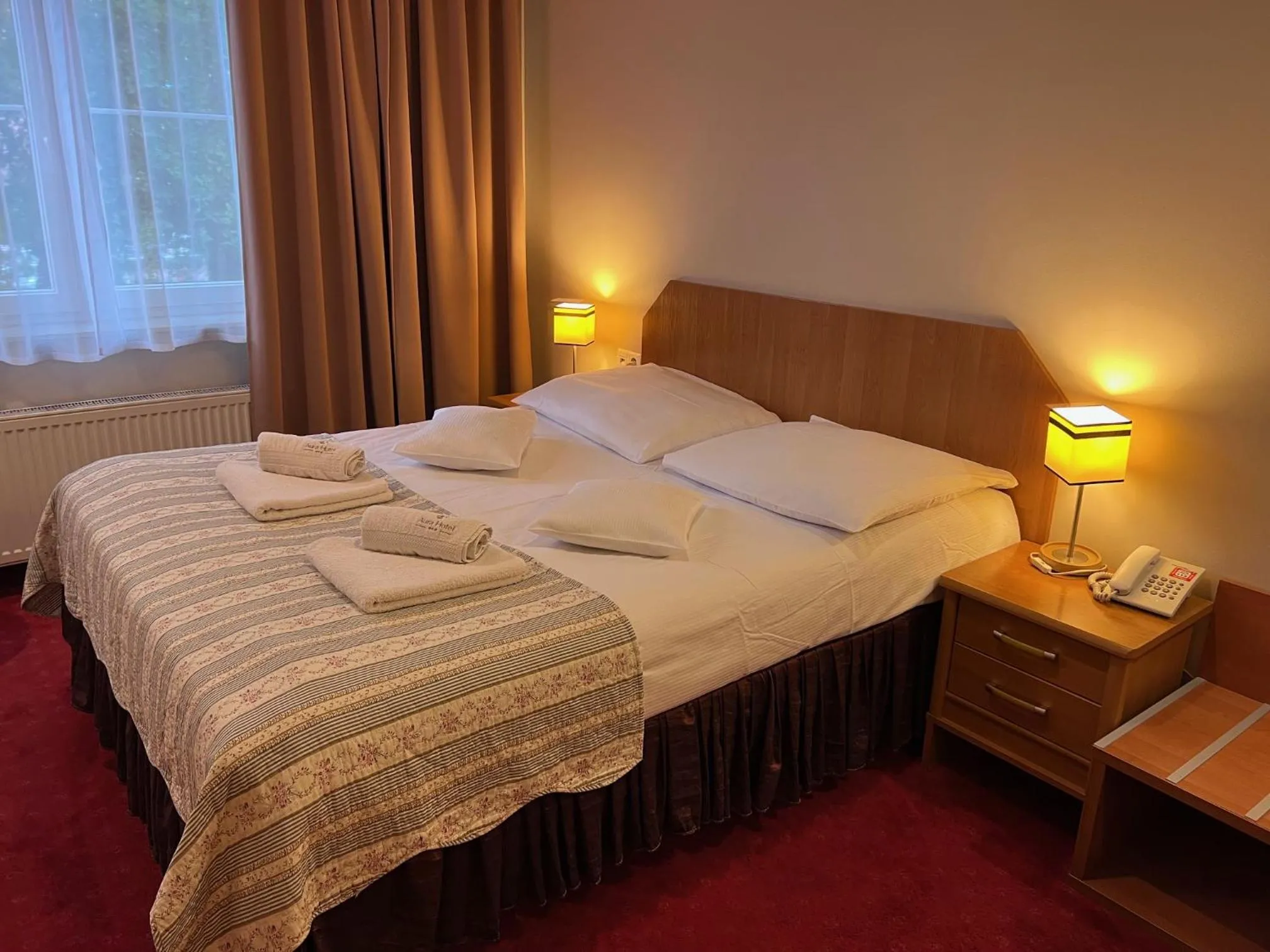 Bed in Aura - Hotel & Restaurant & Sauna
