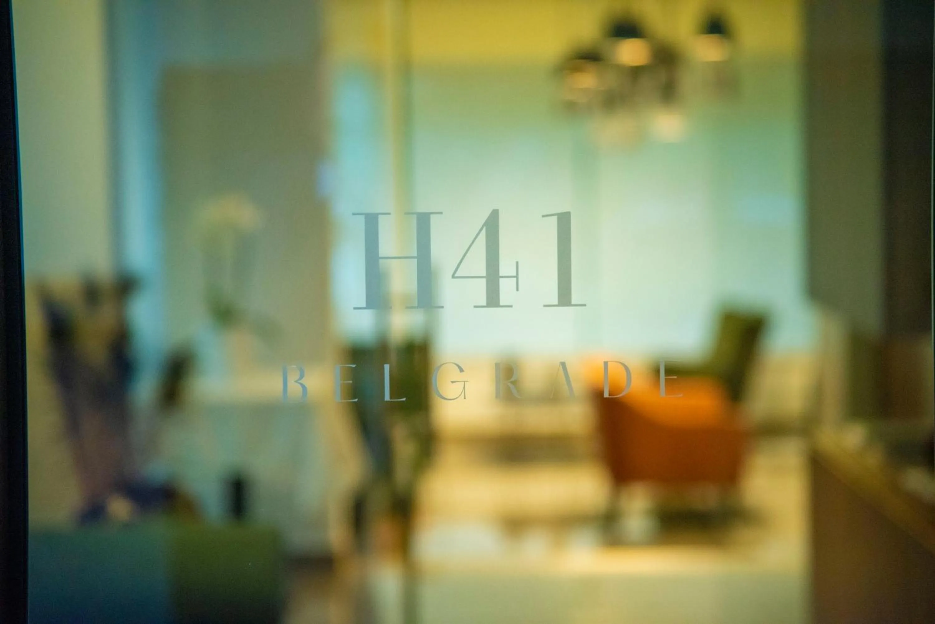 Property logo or sign, Bed in H41 Luxury Suites