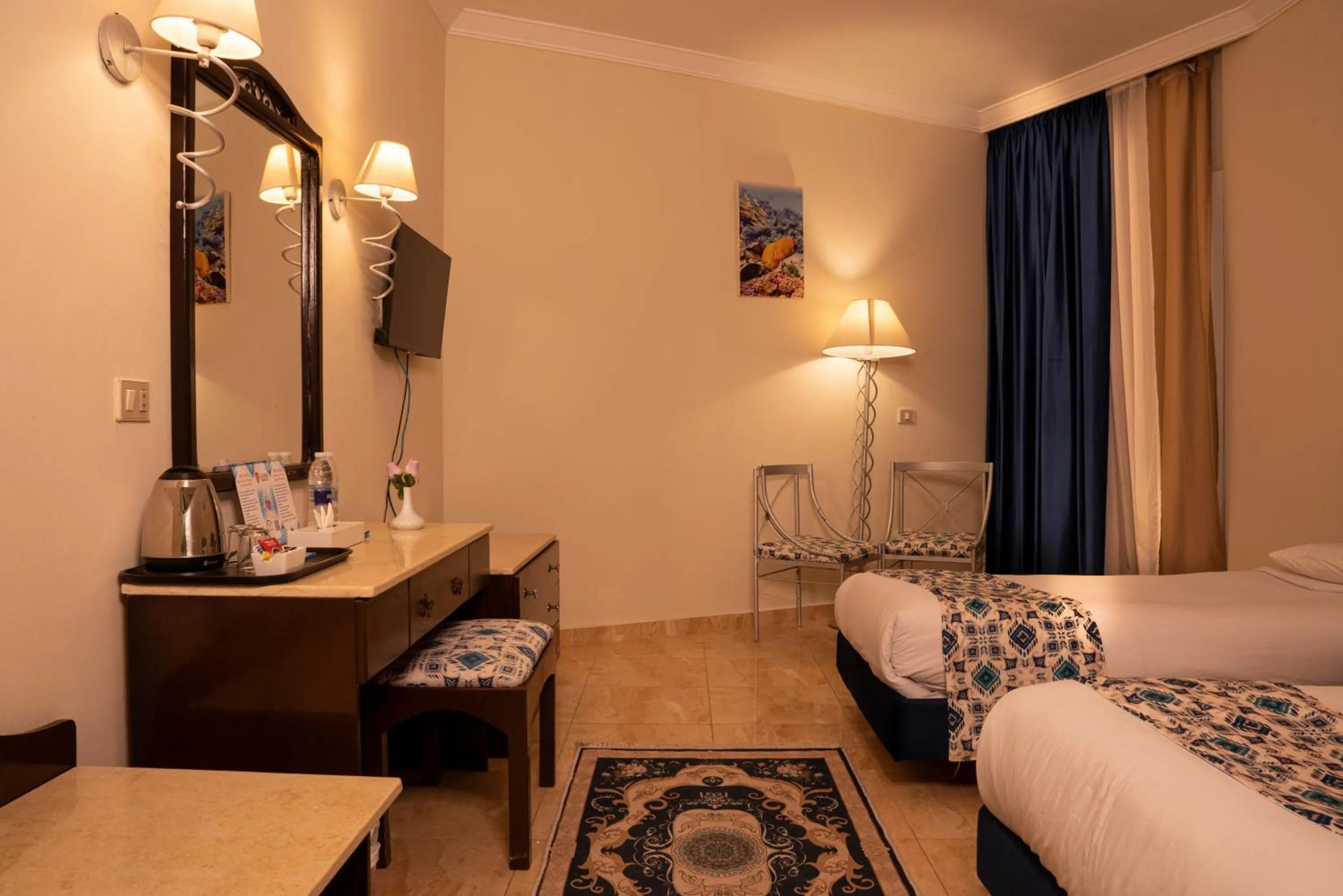 Bed in Dexon Roma Hotel