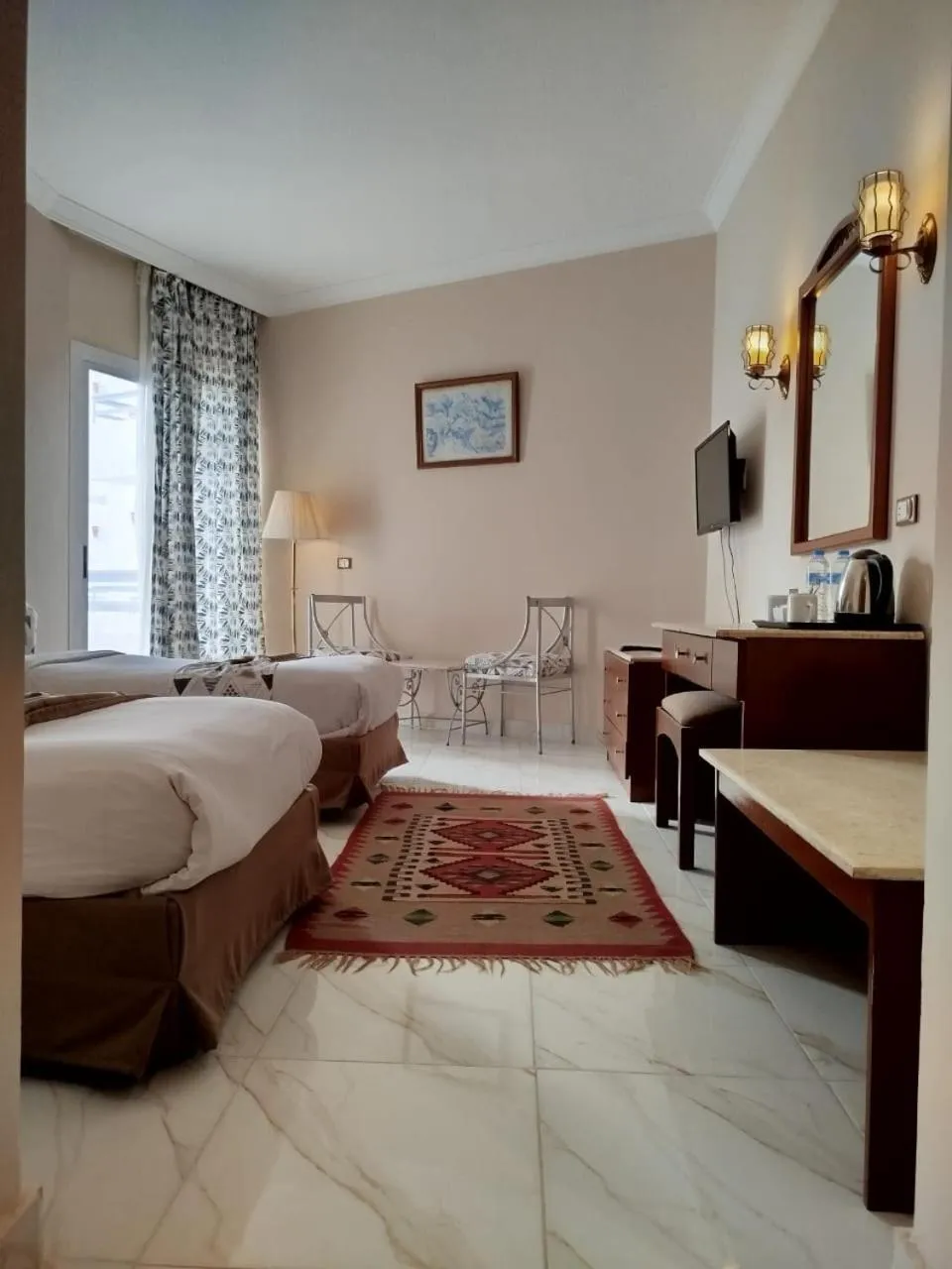 Bed in Dexon Roma Hotel