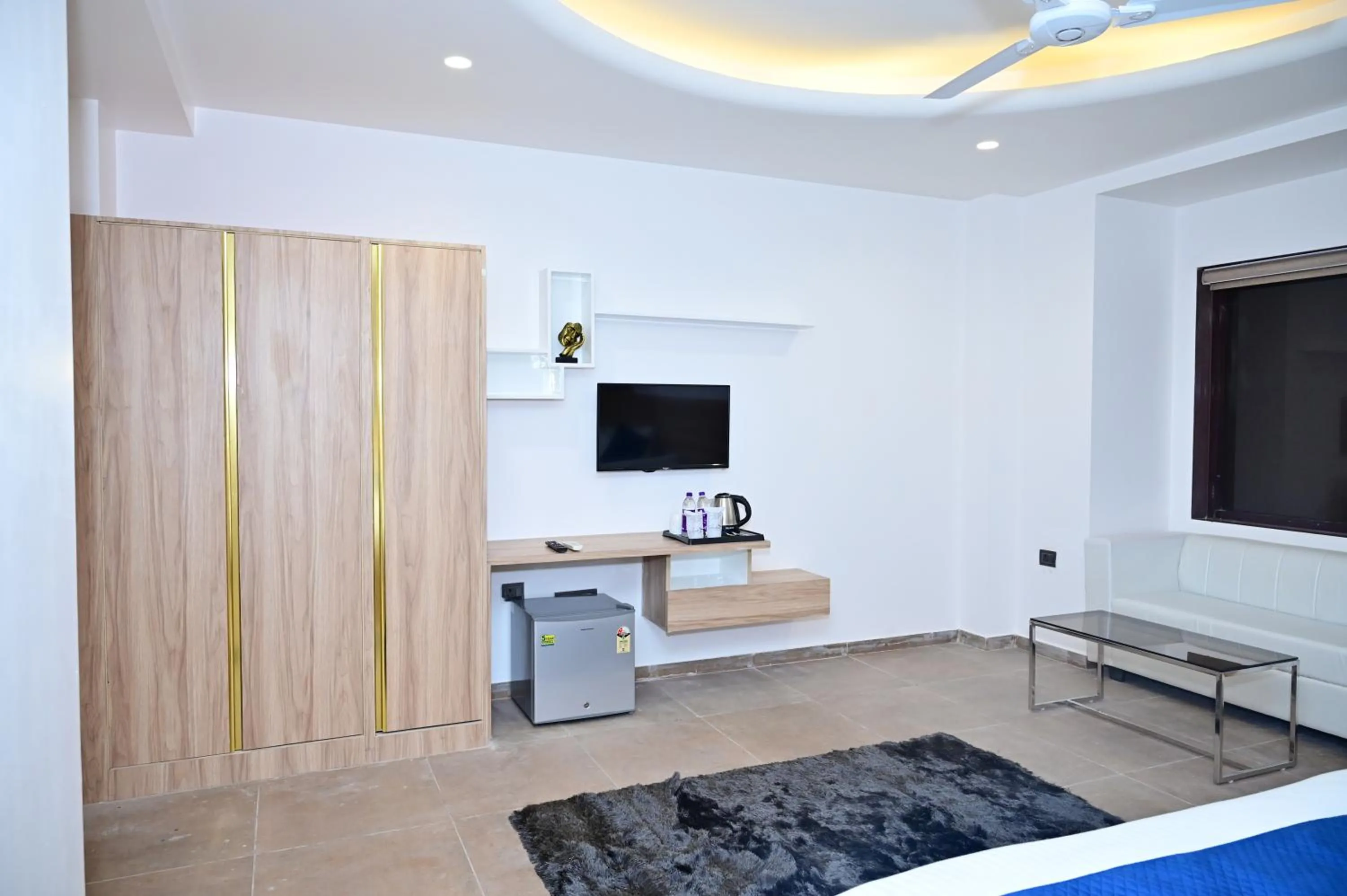 Communal lounge/ TV room in The Dwelling Inn