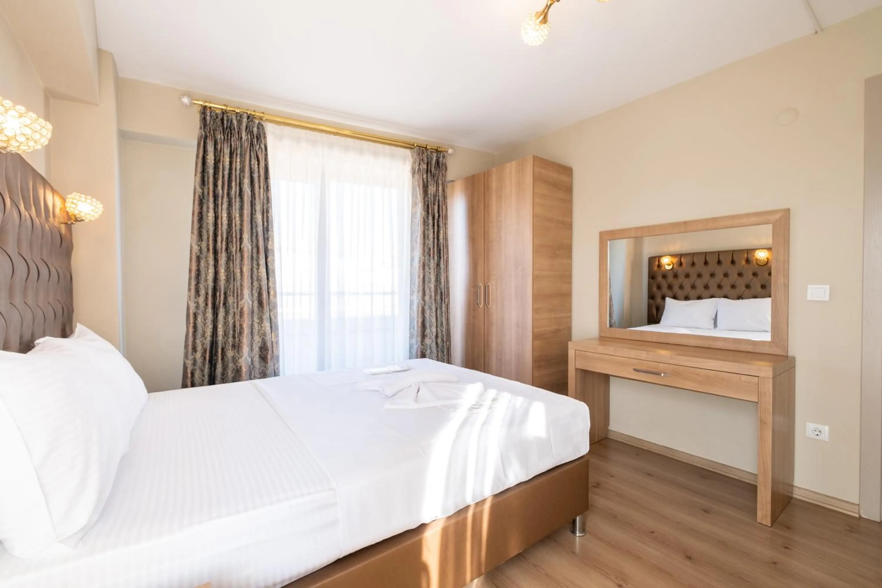 Bed in Lavin Hotel & Suites