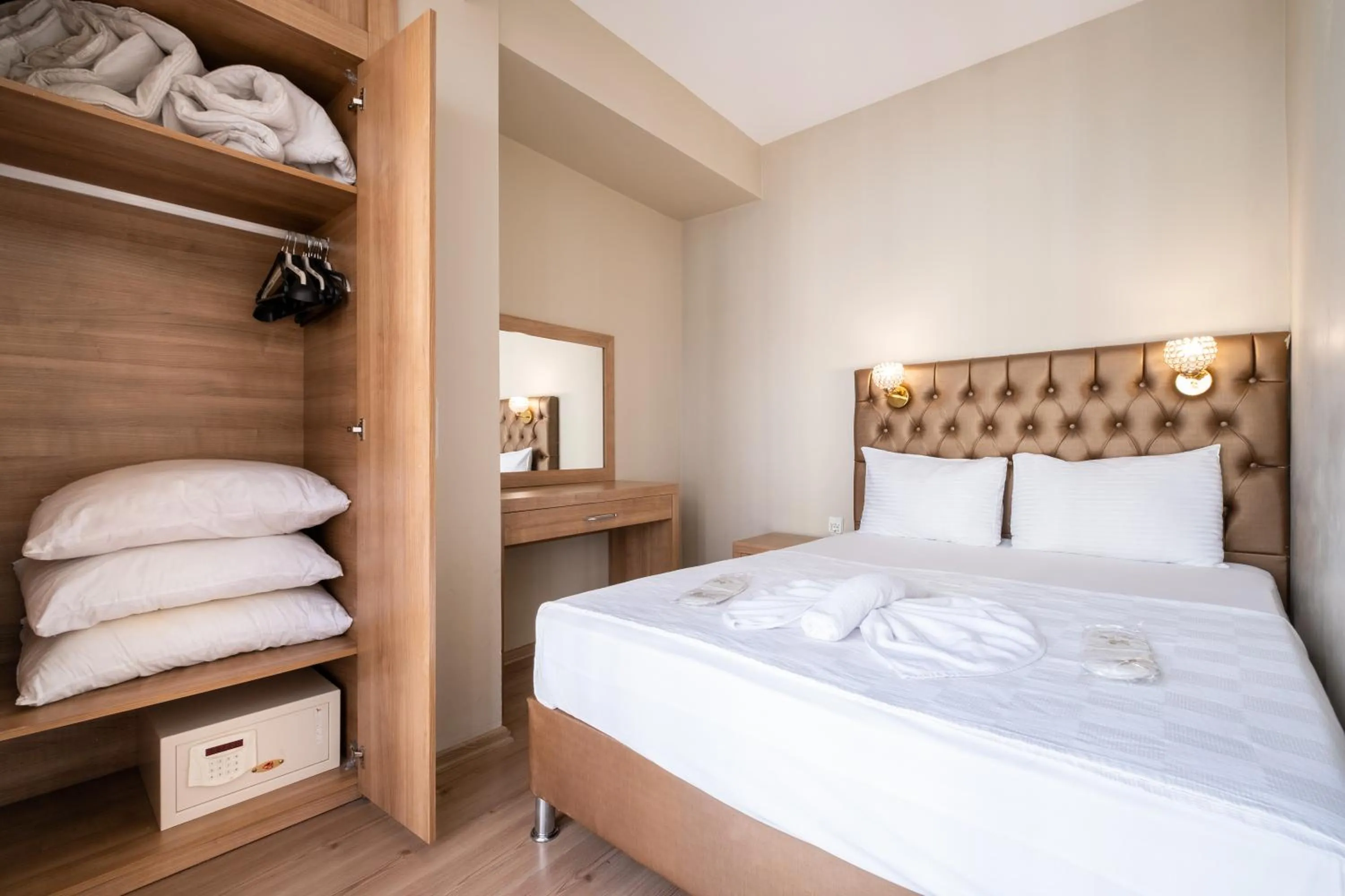 Bed in Lavin Hotel & Suites