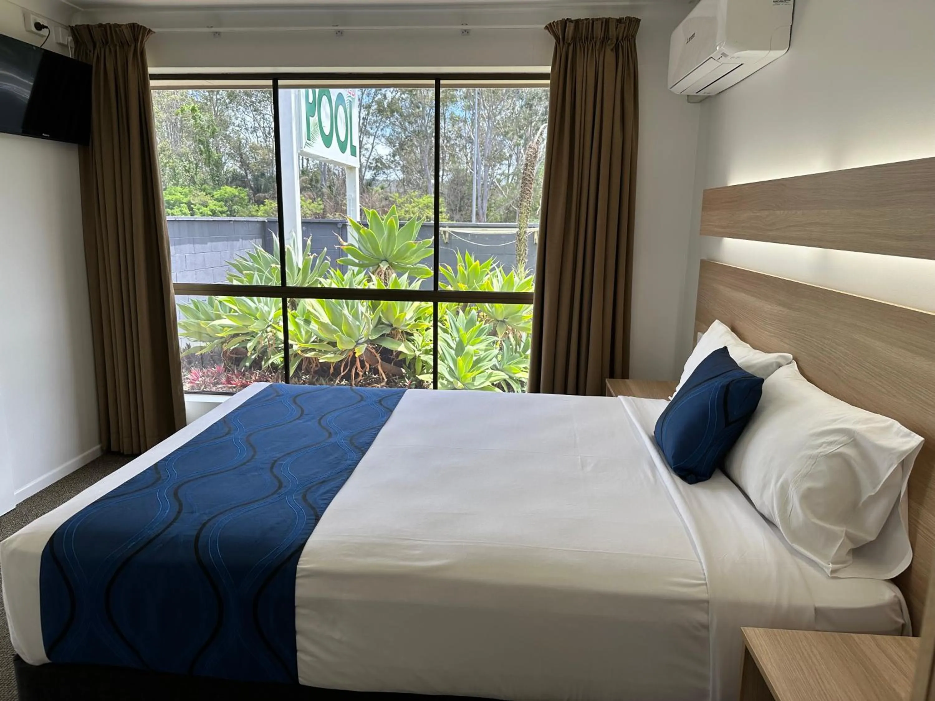 Bedroom, Bed in Logan City Motor Inn