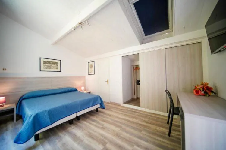 Photo of the whole room, Bed in Hotel Capo Di Stella