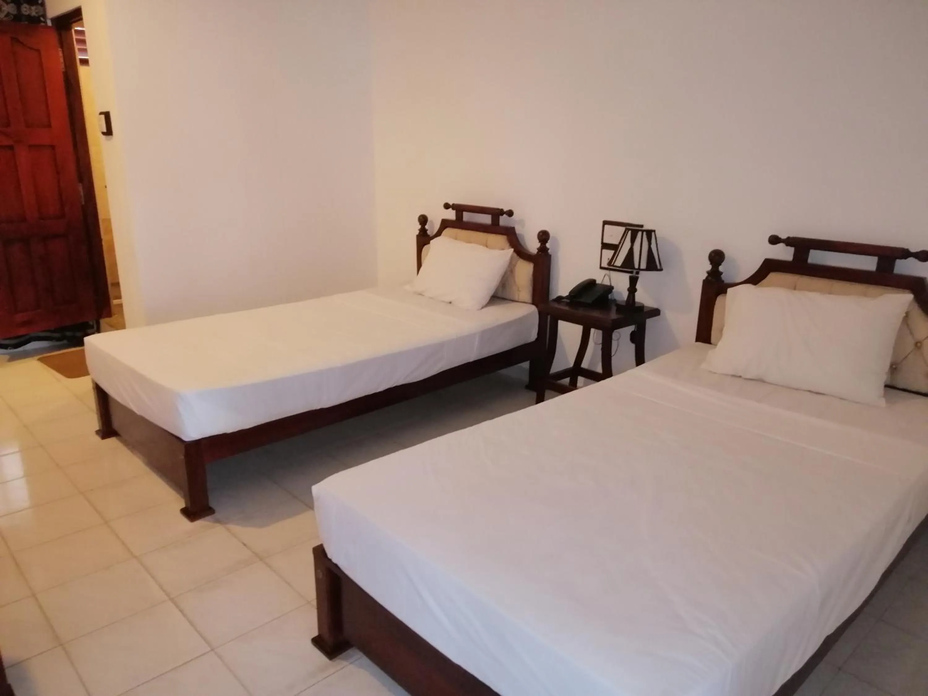 Bed in Centauria City Hotel