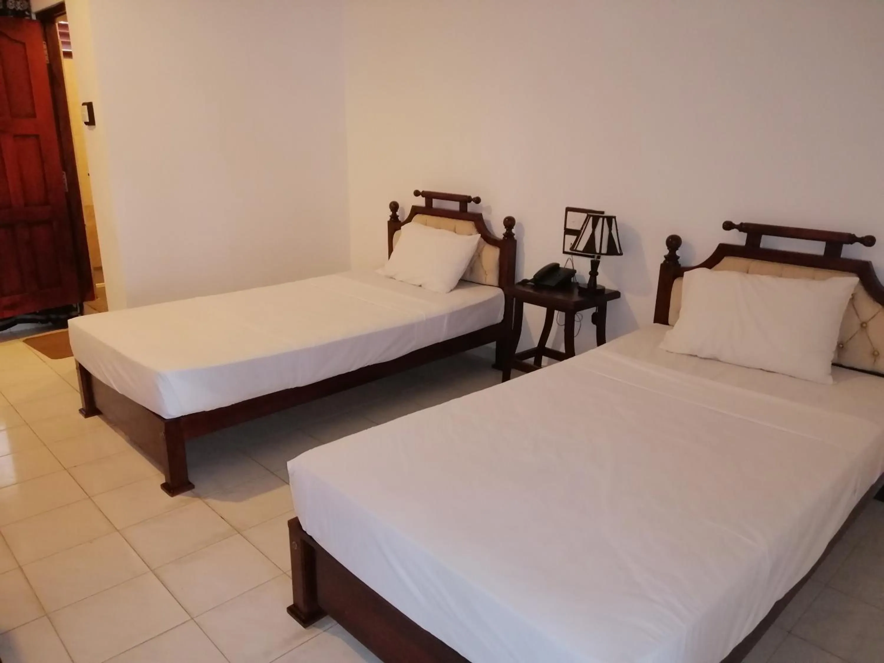 Bed in Centauria City Hotel
