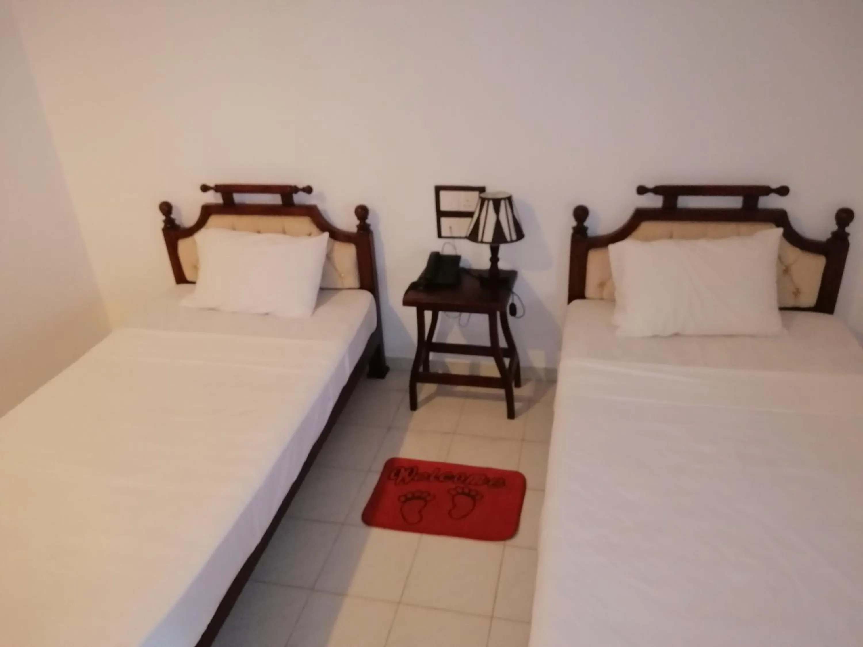 Bed in Centauria City Hotel