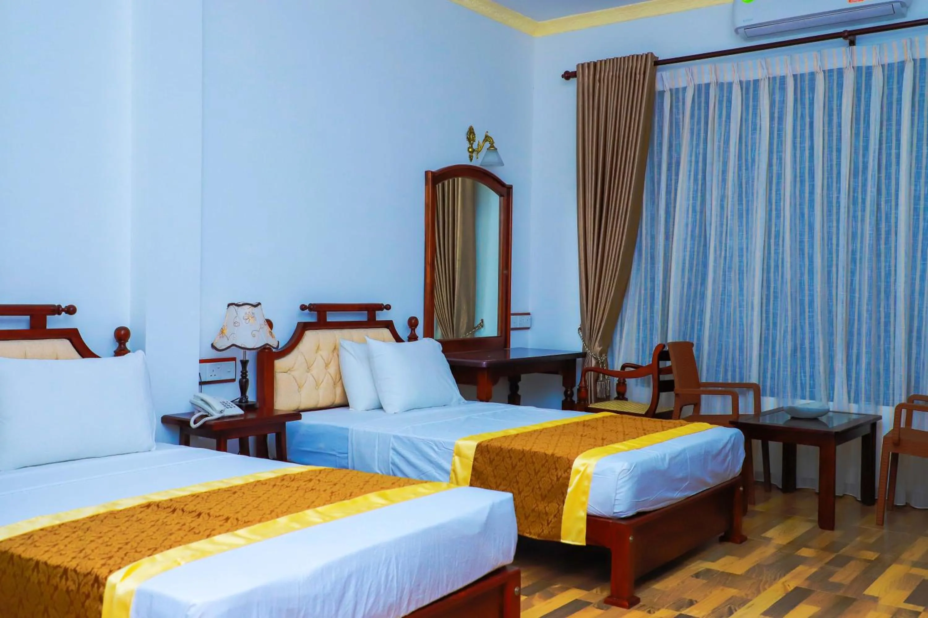 Bed in Centauria City Hotel