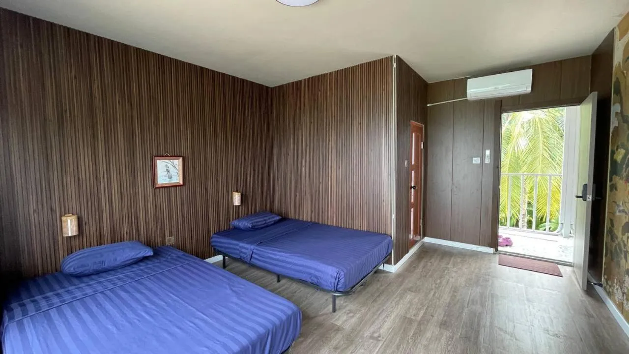 Bed in WHITE SAND ARK RESORT