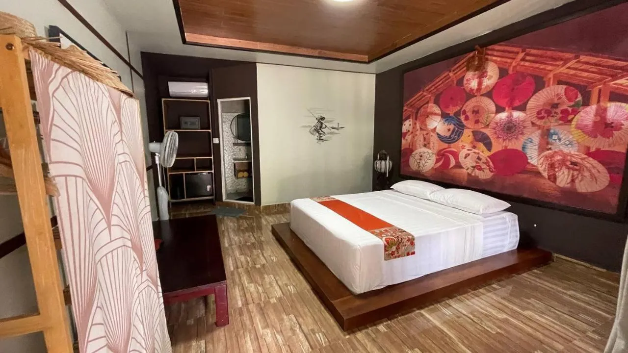 Bed in WHITE SAND ARK RESORT