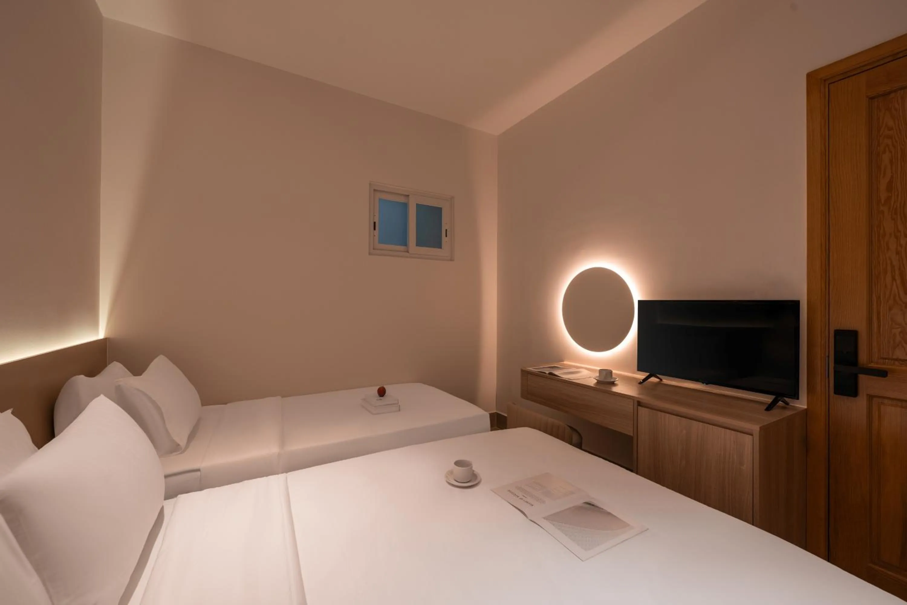 Bed in The Cozy Inn Hotel Ho Chi Minh