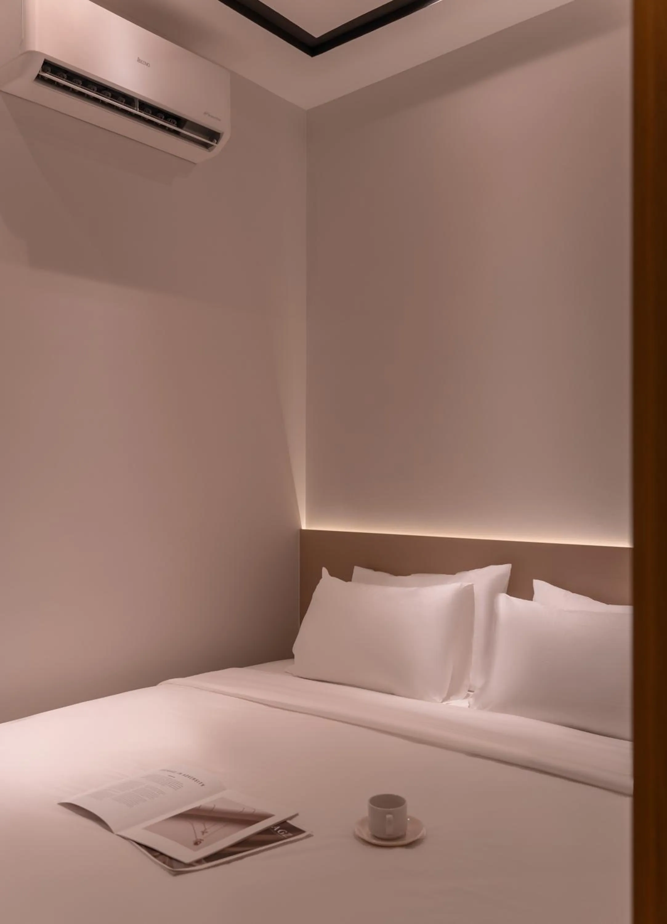 Bed in The Cozy Inn Hotel Ho Chi Minh