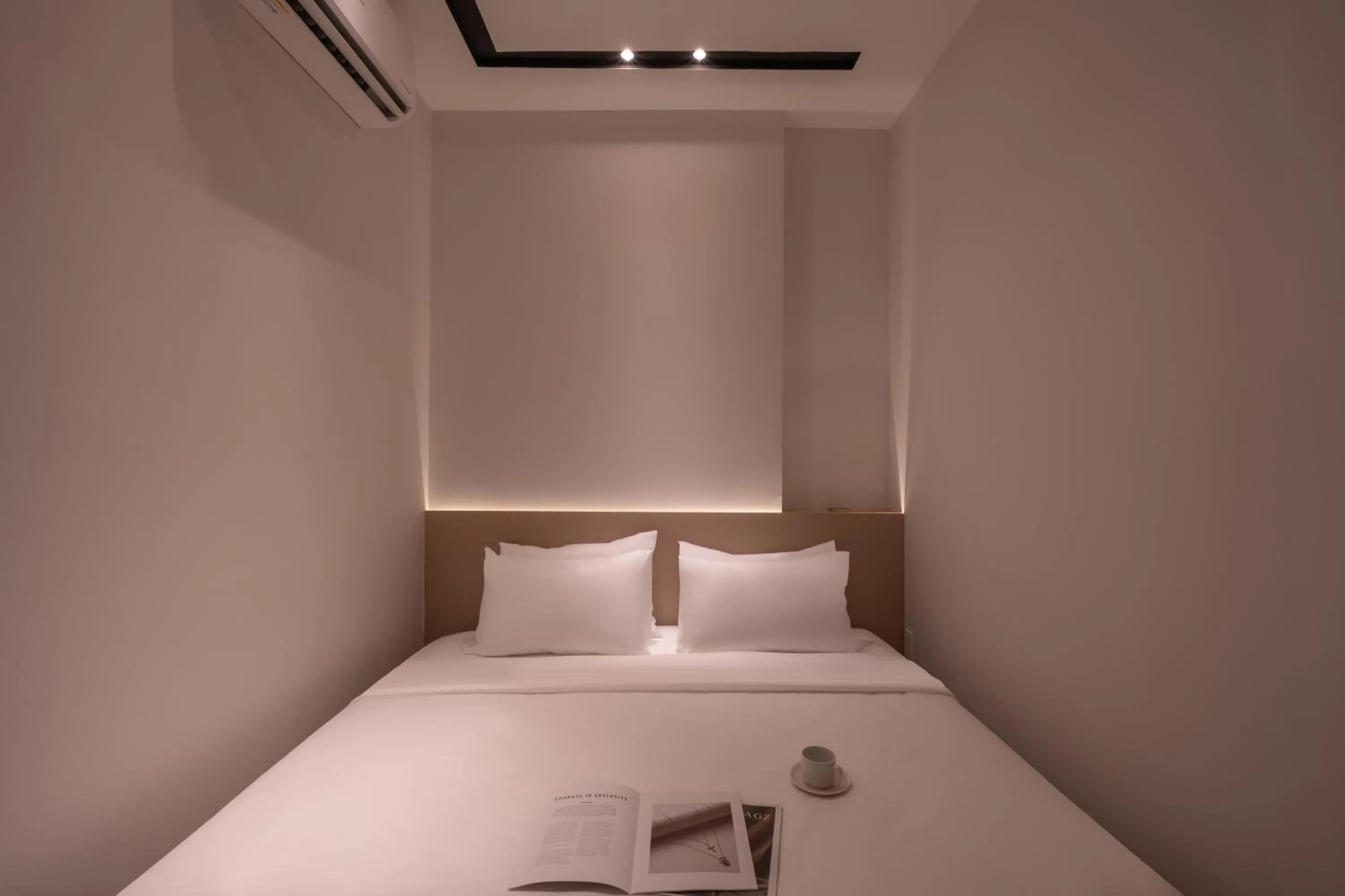 Bed in The Cozy Inn Hotel Ho Chi Minh