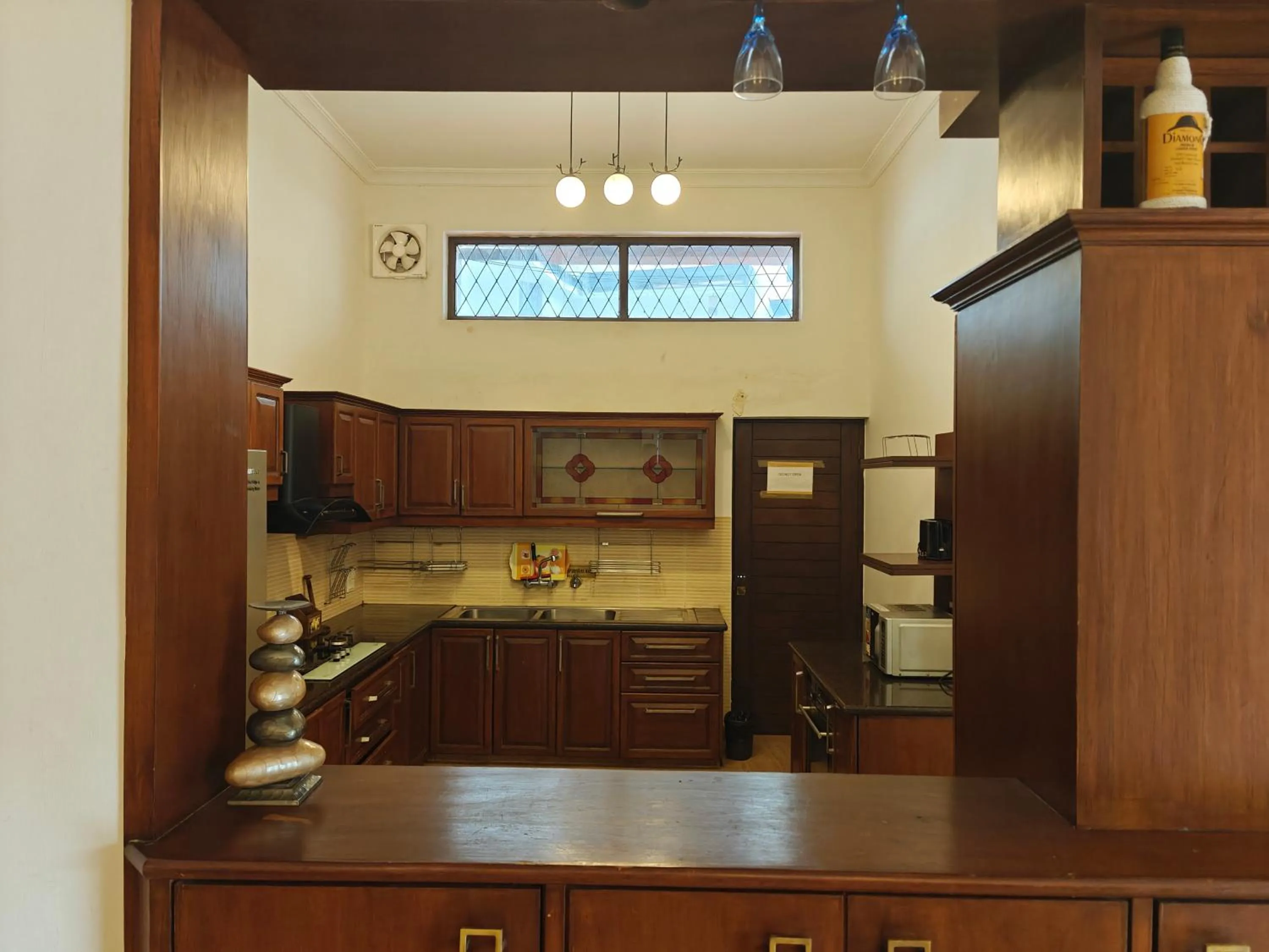 Kitchen or kitchenette in La Sunila suites Baga by WSI
