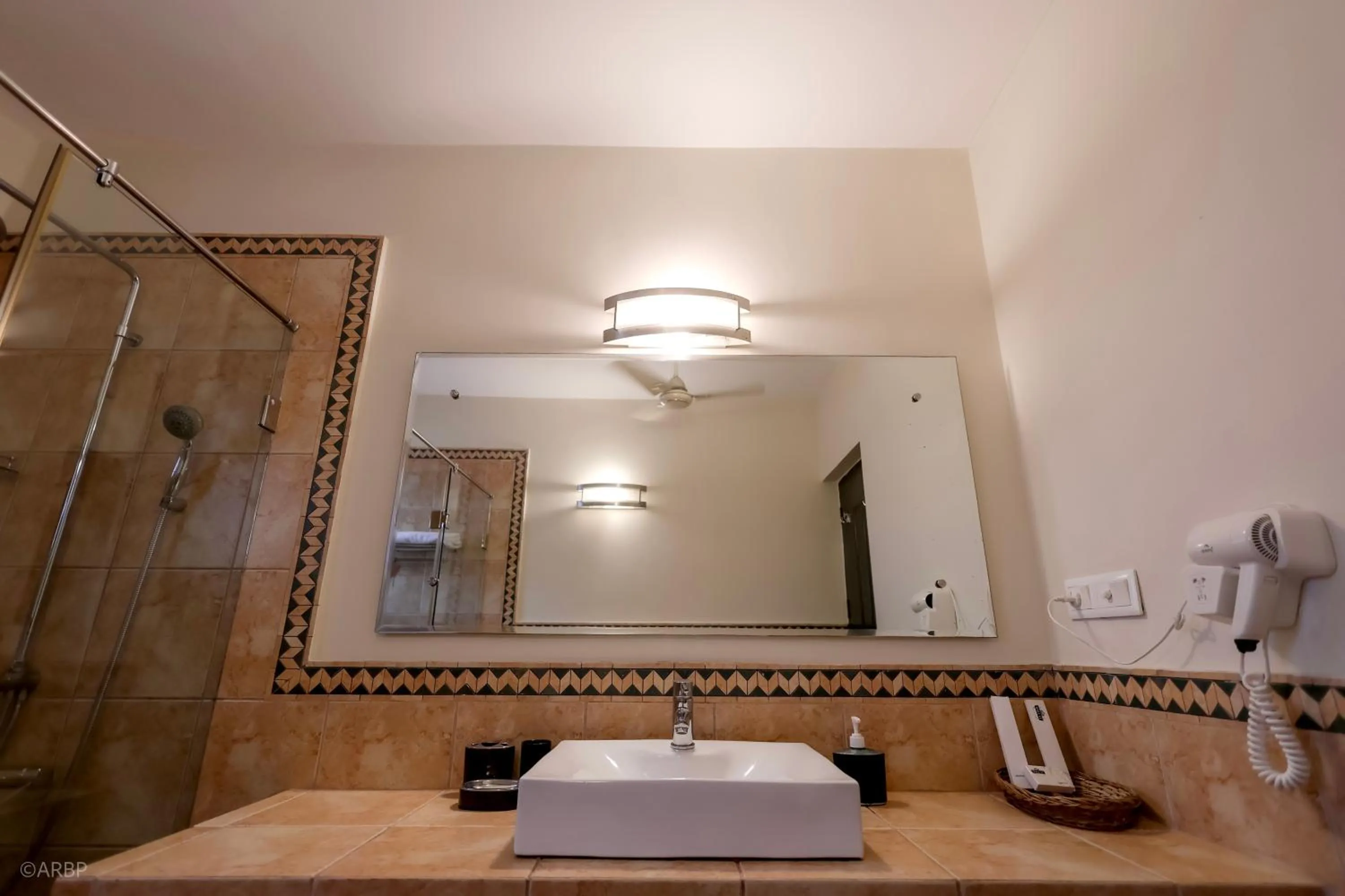 Bathroom in La Sunila suites Baga by WSI