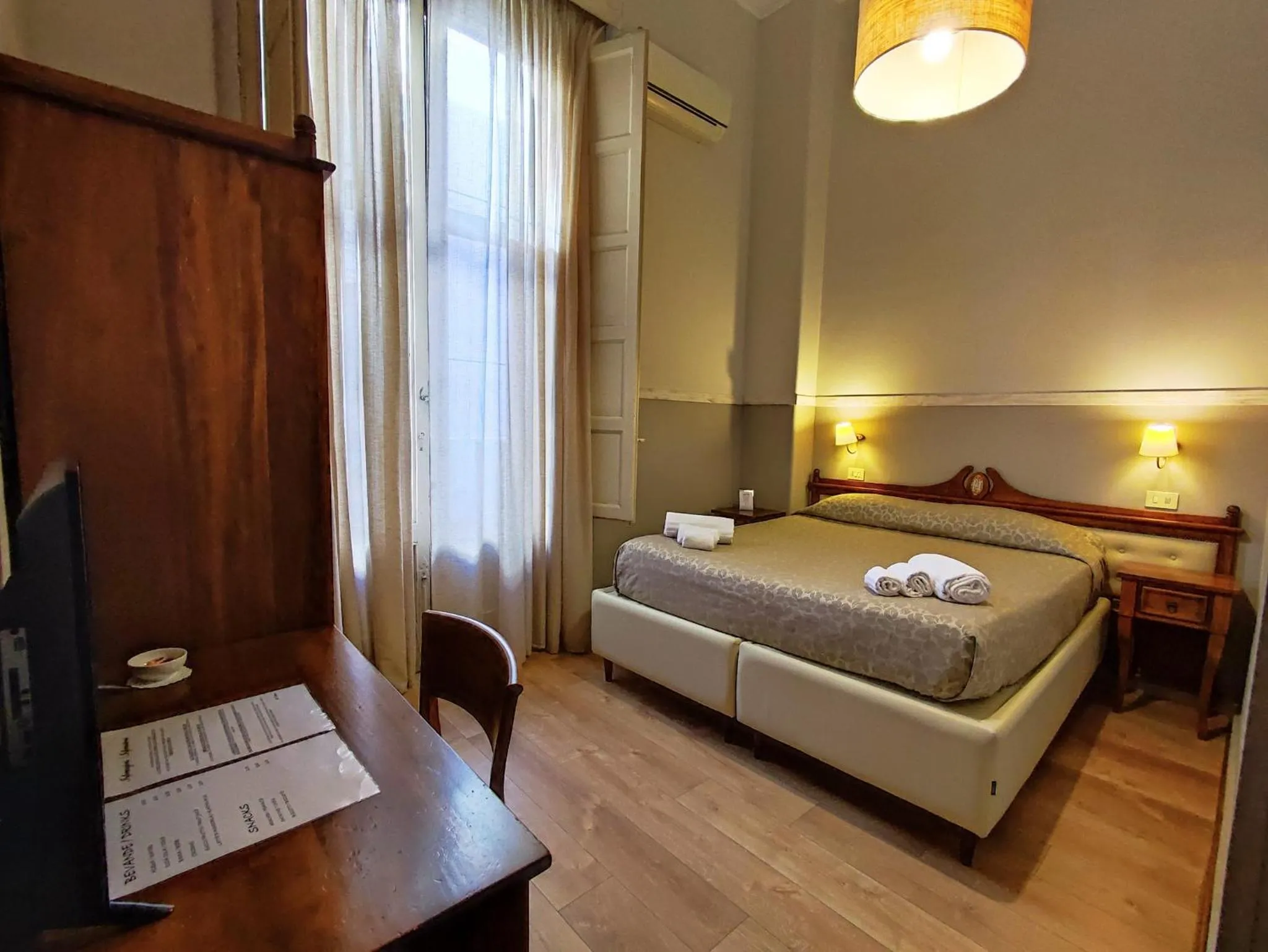 Bed in La Collegiata Guest House