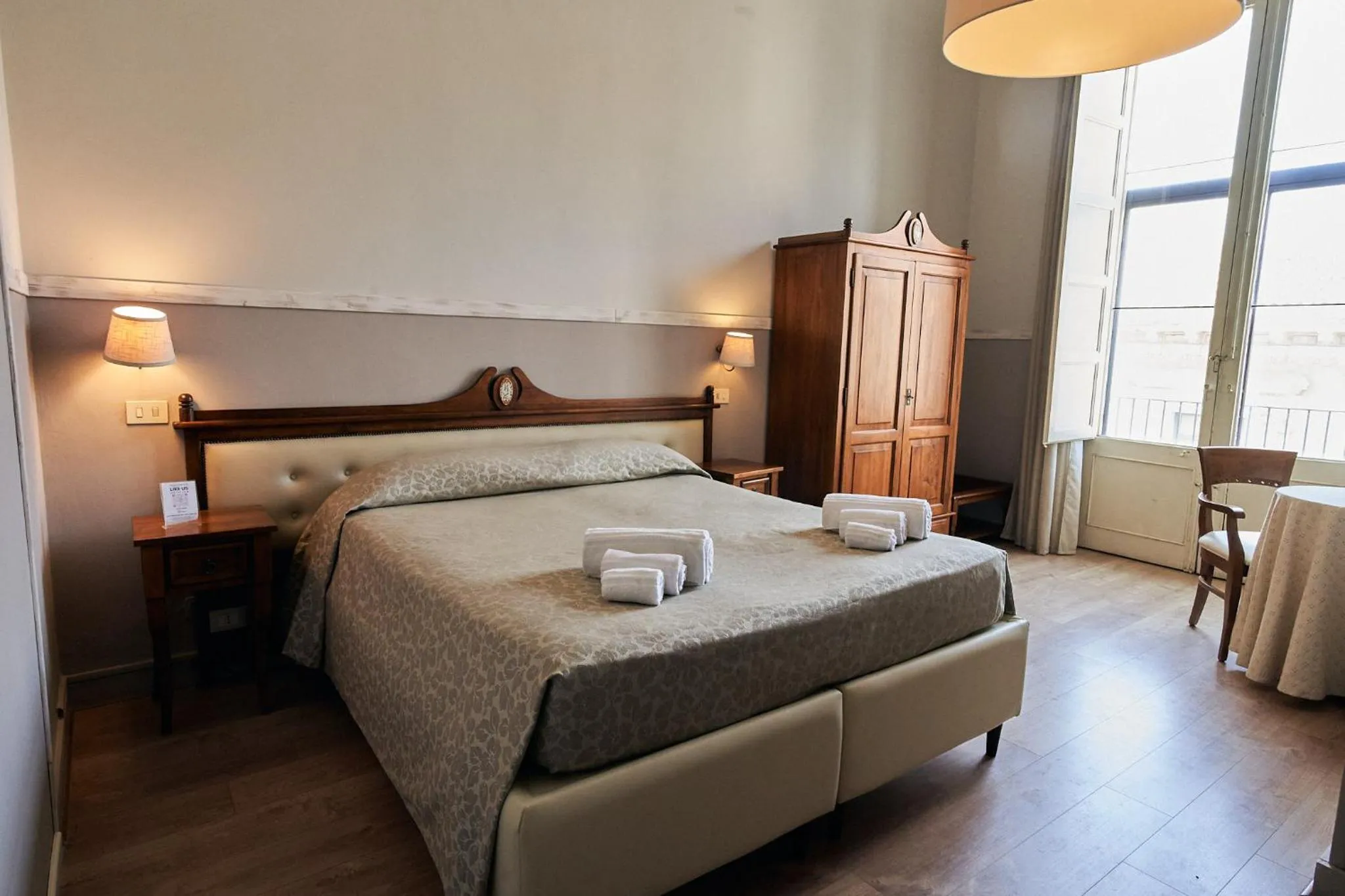 Bed in La Collegiata Guest House