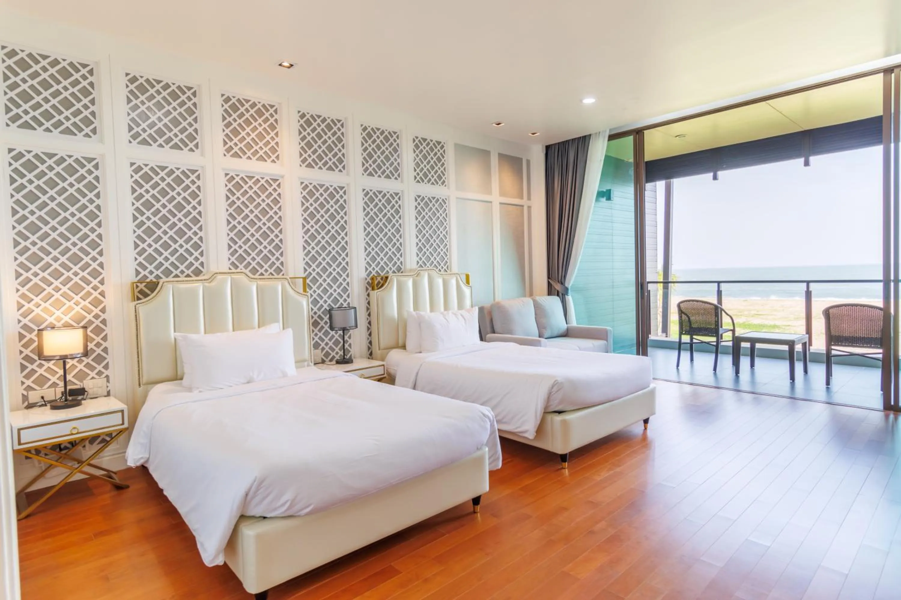 Bed in Sea Sand Sun Hua Hin by JC Kevin Hotel & Resort