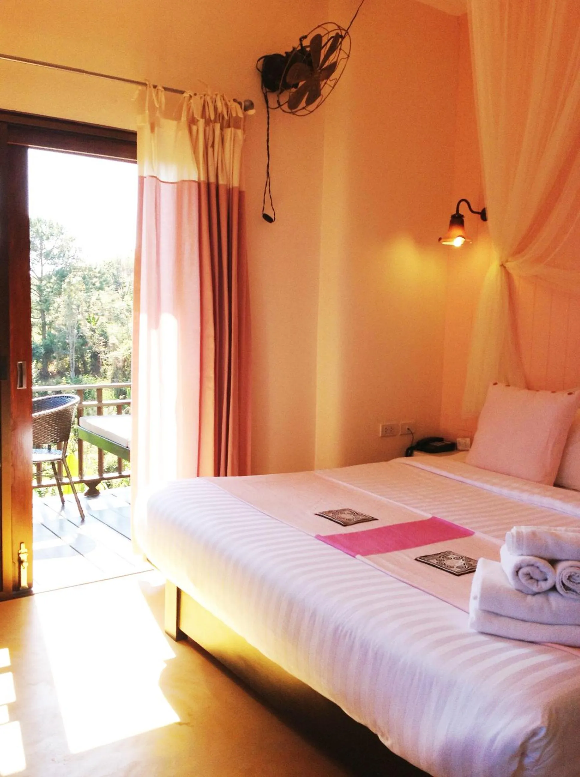 Bed in Phumorkdao Resort