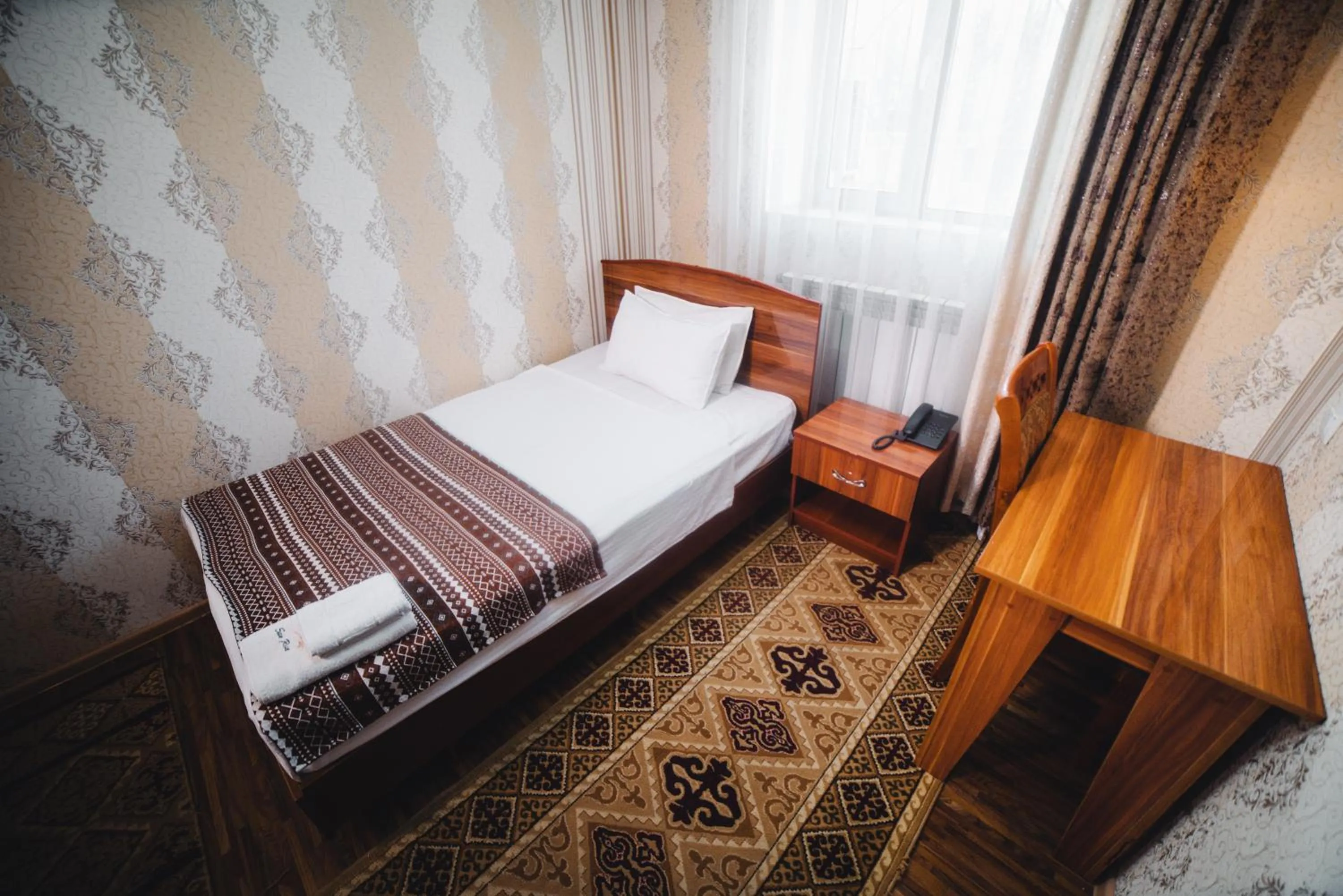 Photo of the whole room, Bed in Sunrise Osh