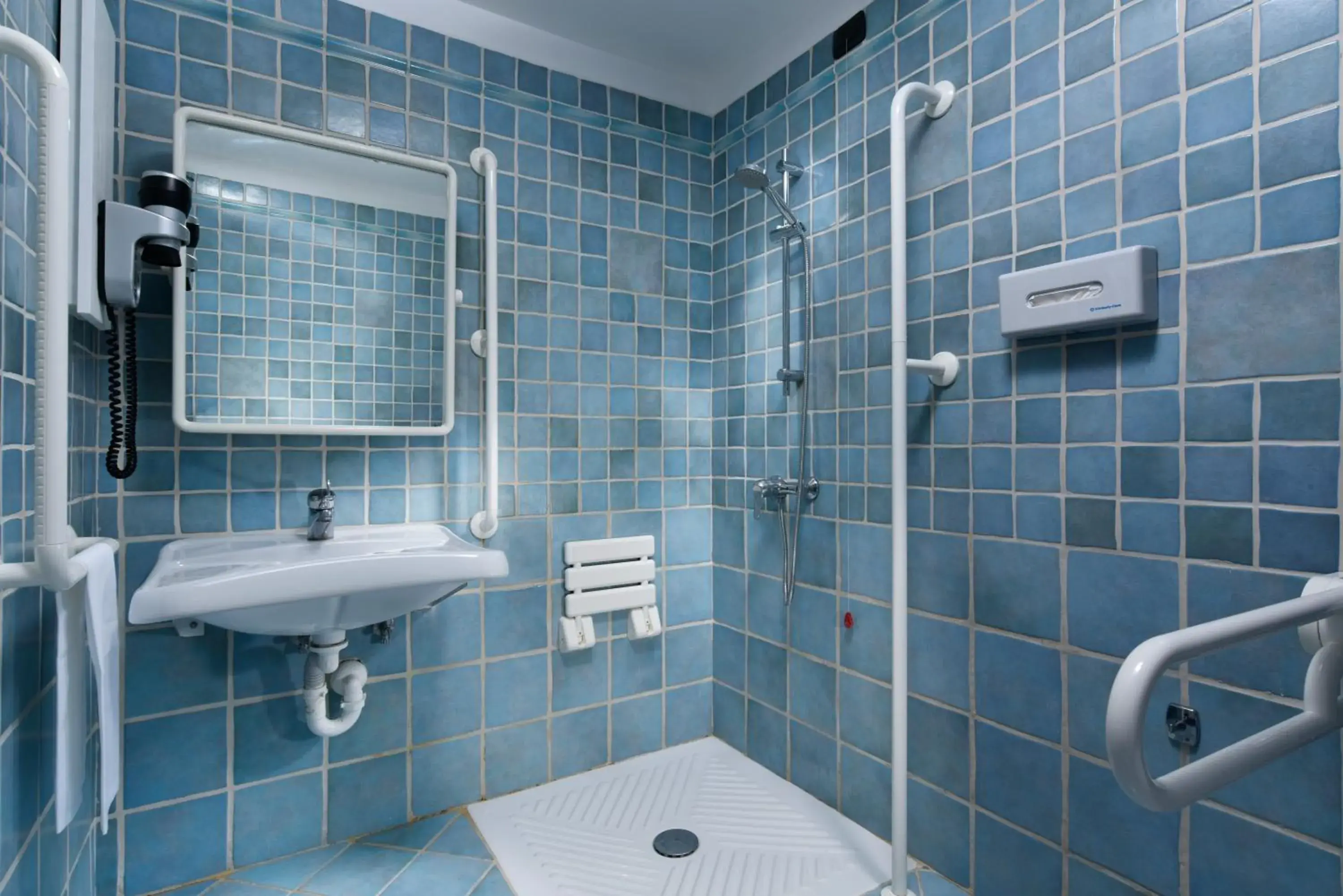 Bathroom in UNA Hotels Capotaormina Bathroom in UNA Hotels Capotaormina