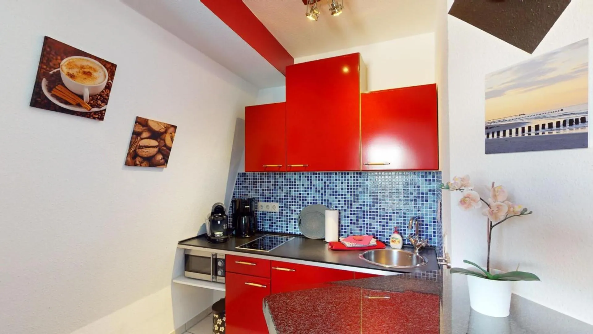 Kitchen or kitchenette in Apartments am Sund