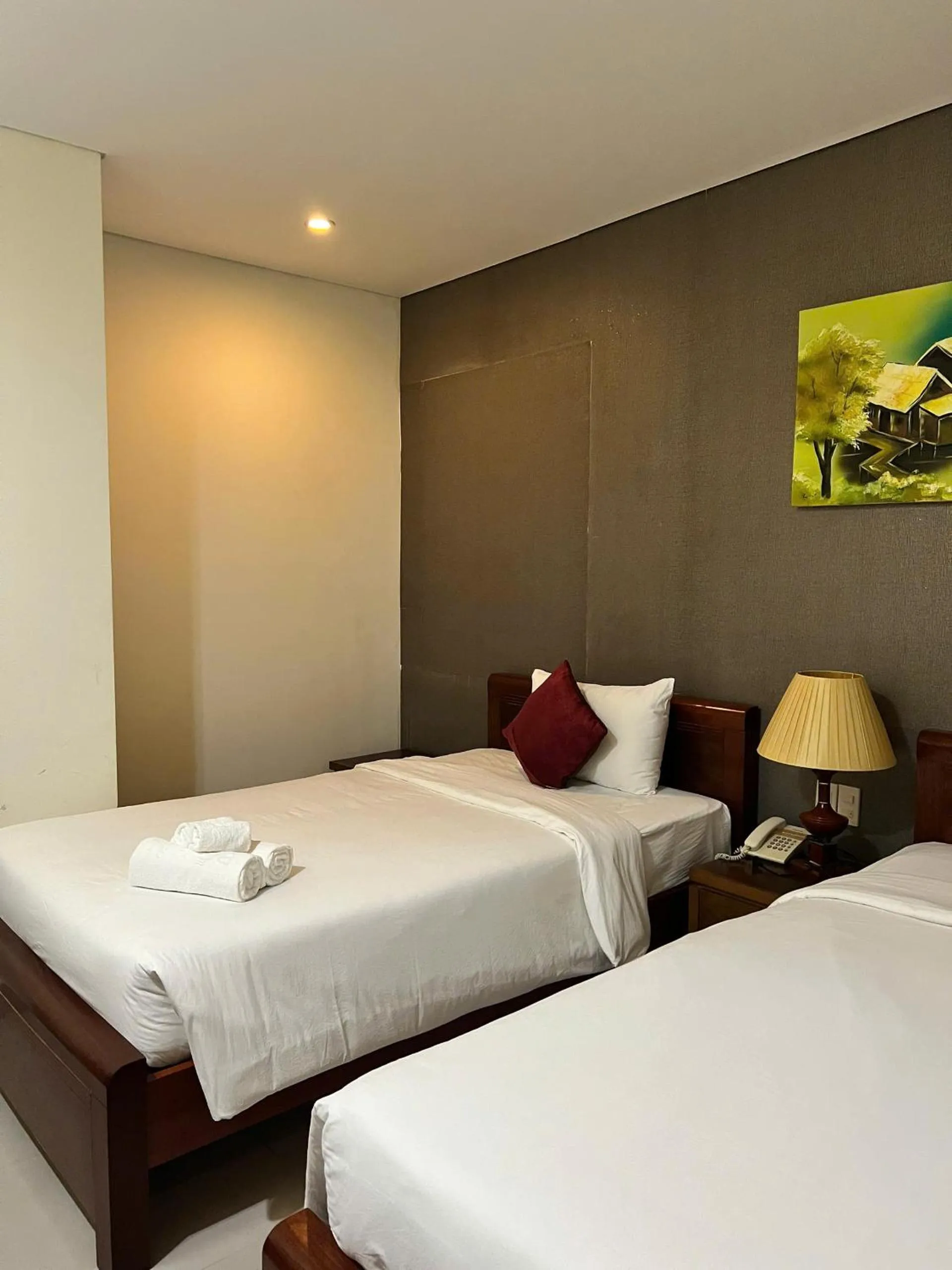 Bed in Doha Central Bliss Danang Hotel by Haviland