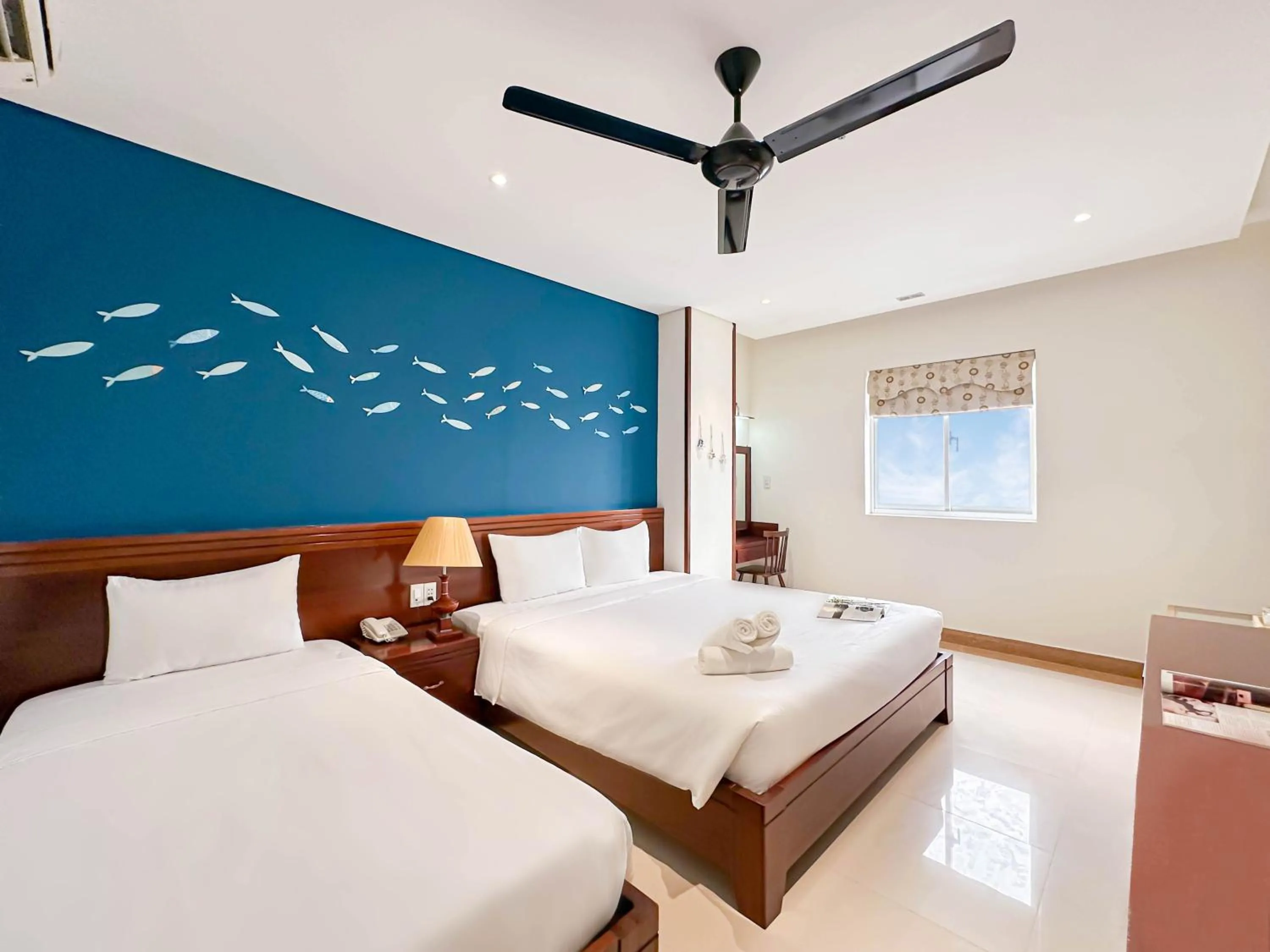 Bed in Doha Central Bliss Danang Hotel by Haviland