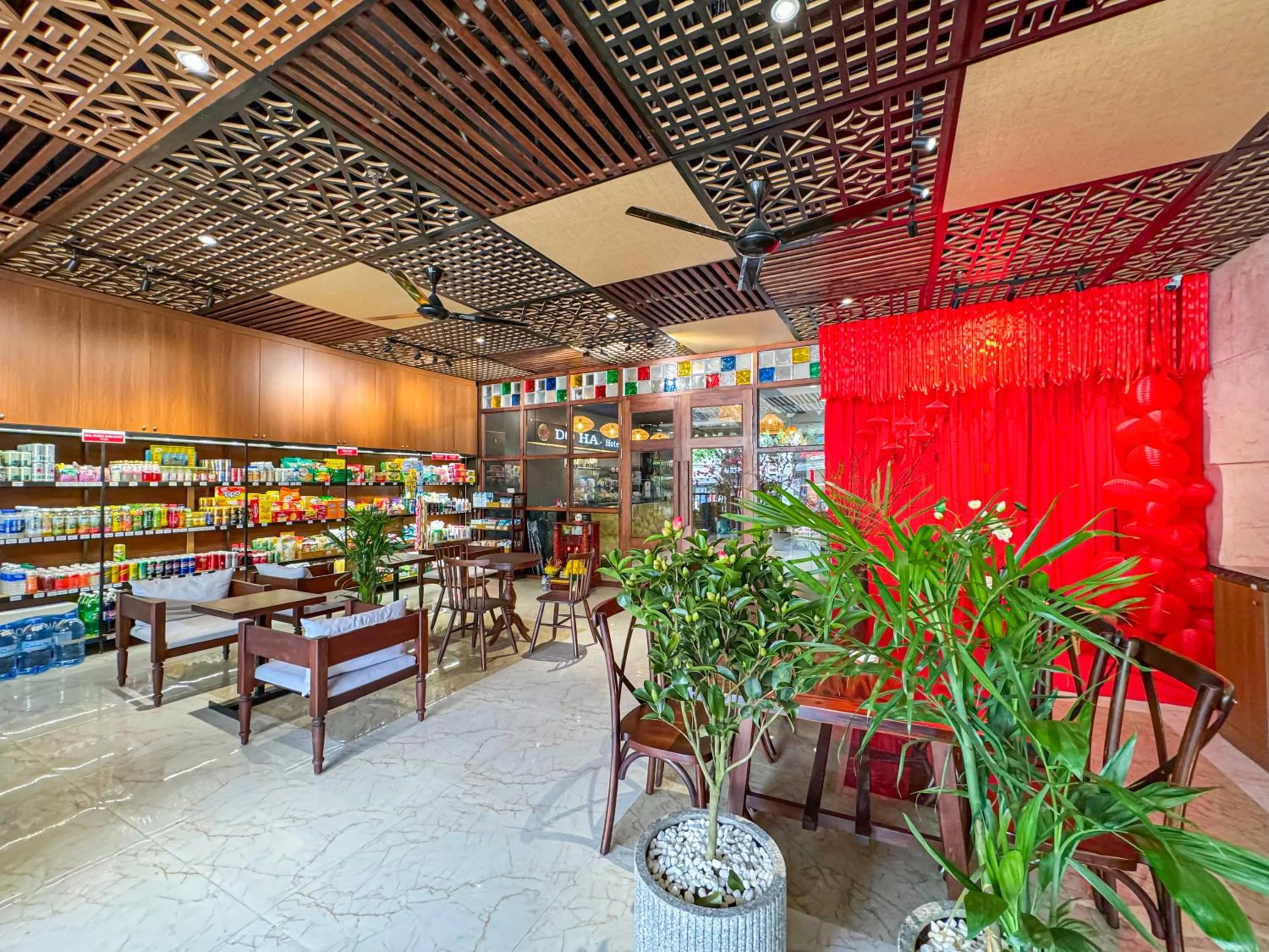 Communal lounge/ TV room in Doha Central Bliss Danang Hotel by Haviland