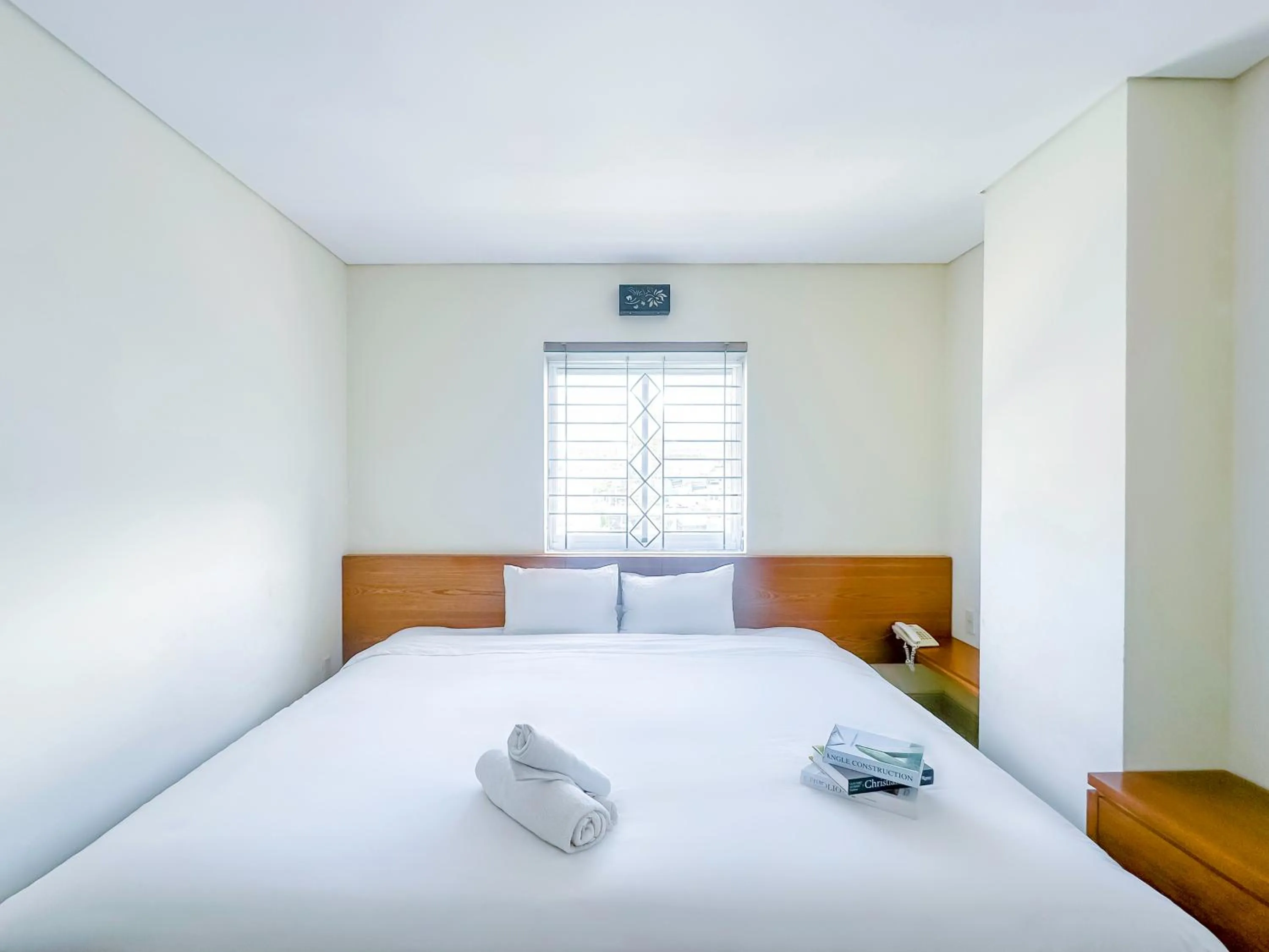 Bed in Doha Central Bliss Danang Hotel by Haviland