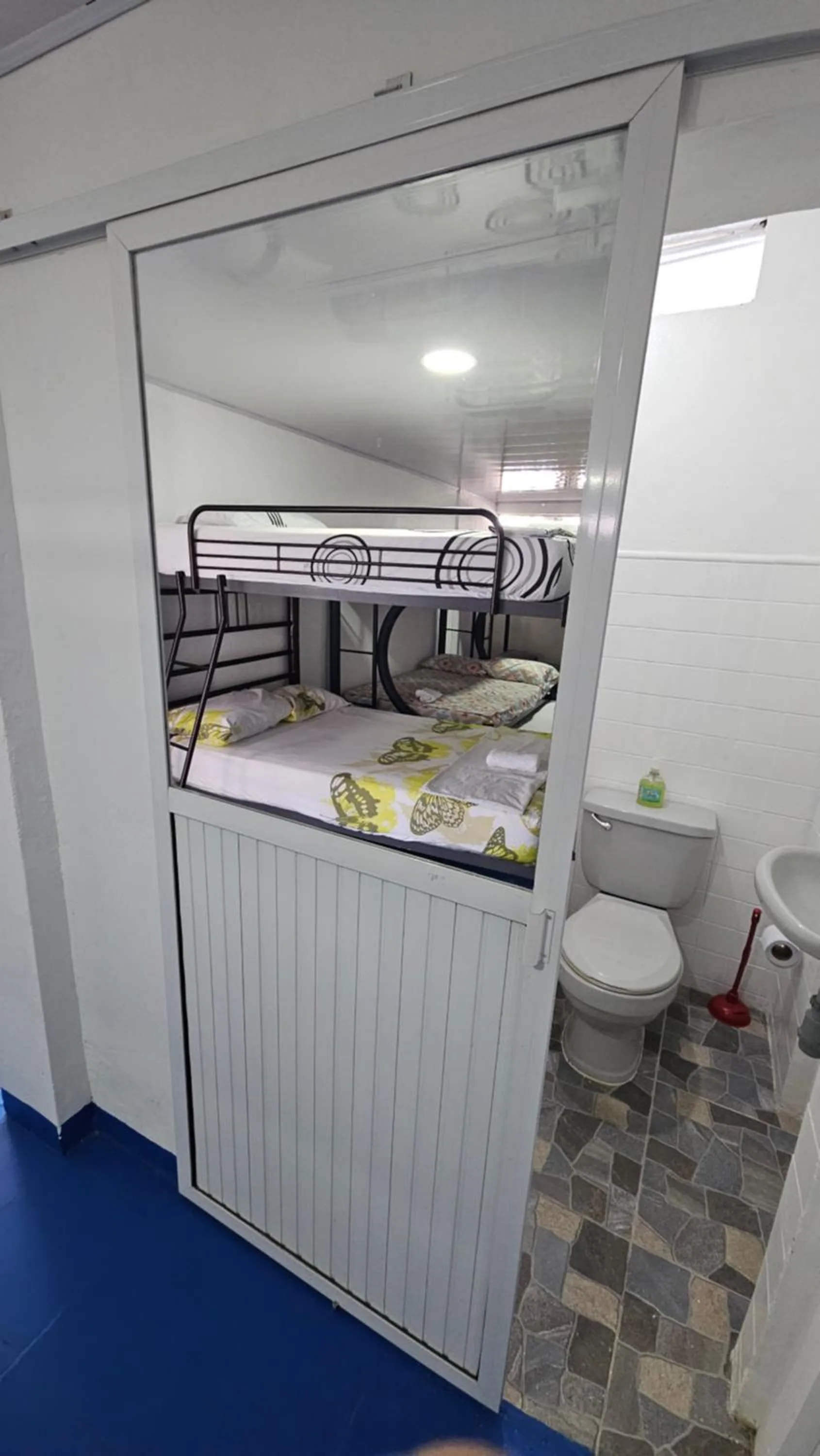 Toilet, Bed in Mom's house Colombia
