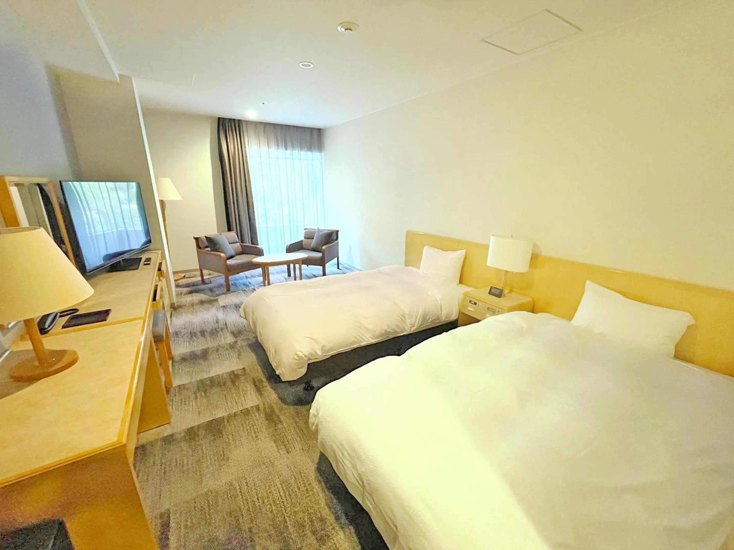 Photo of the whole room, Bed in Grandvrio Hotel Unazukionsen