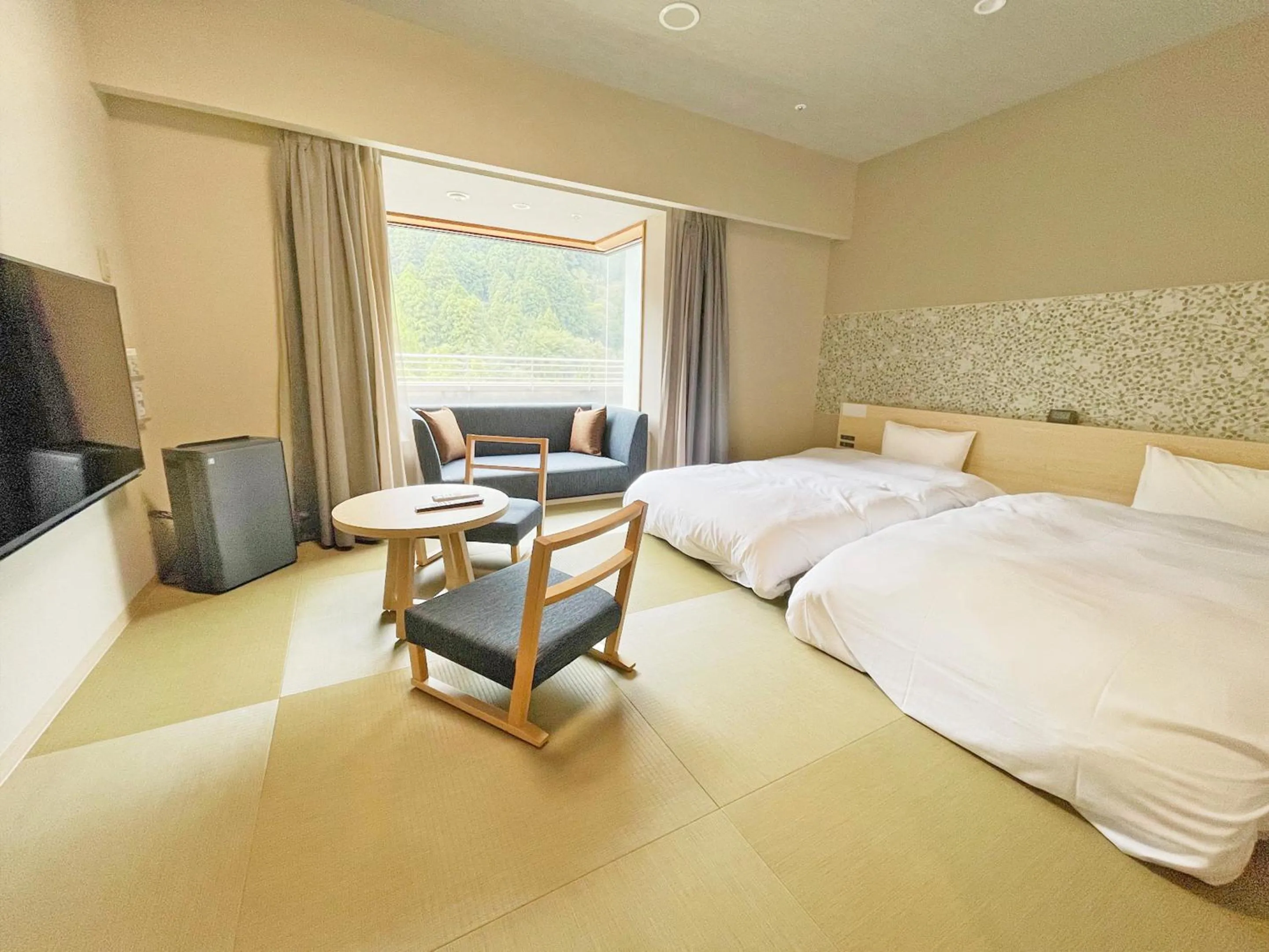 Photo of the whole room, Bed in Grandvrio Hotel Unazukionsen