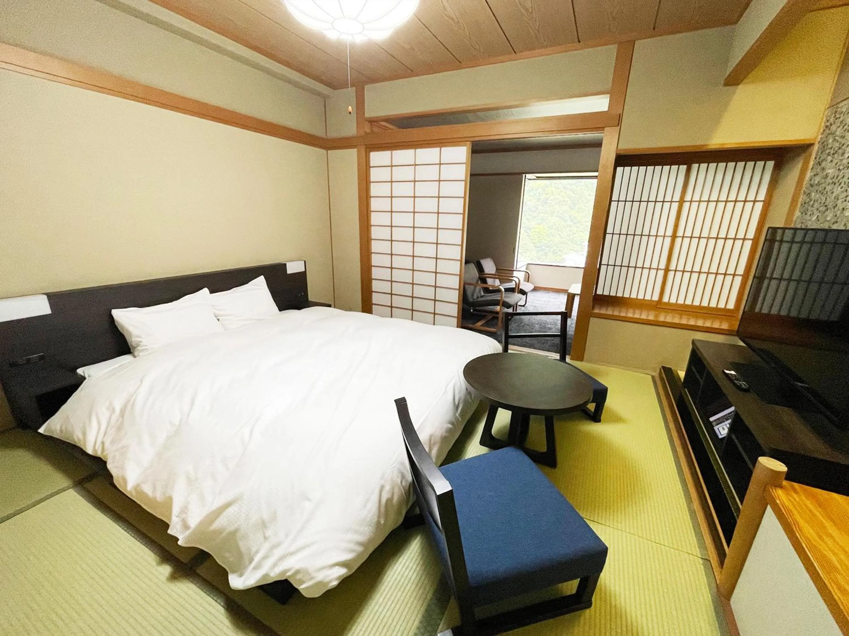 Photo of the whole room, Bed in Grandvrio Hotel Unazukionsen