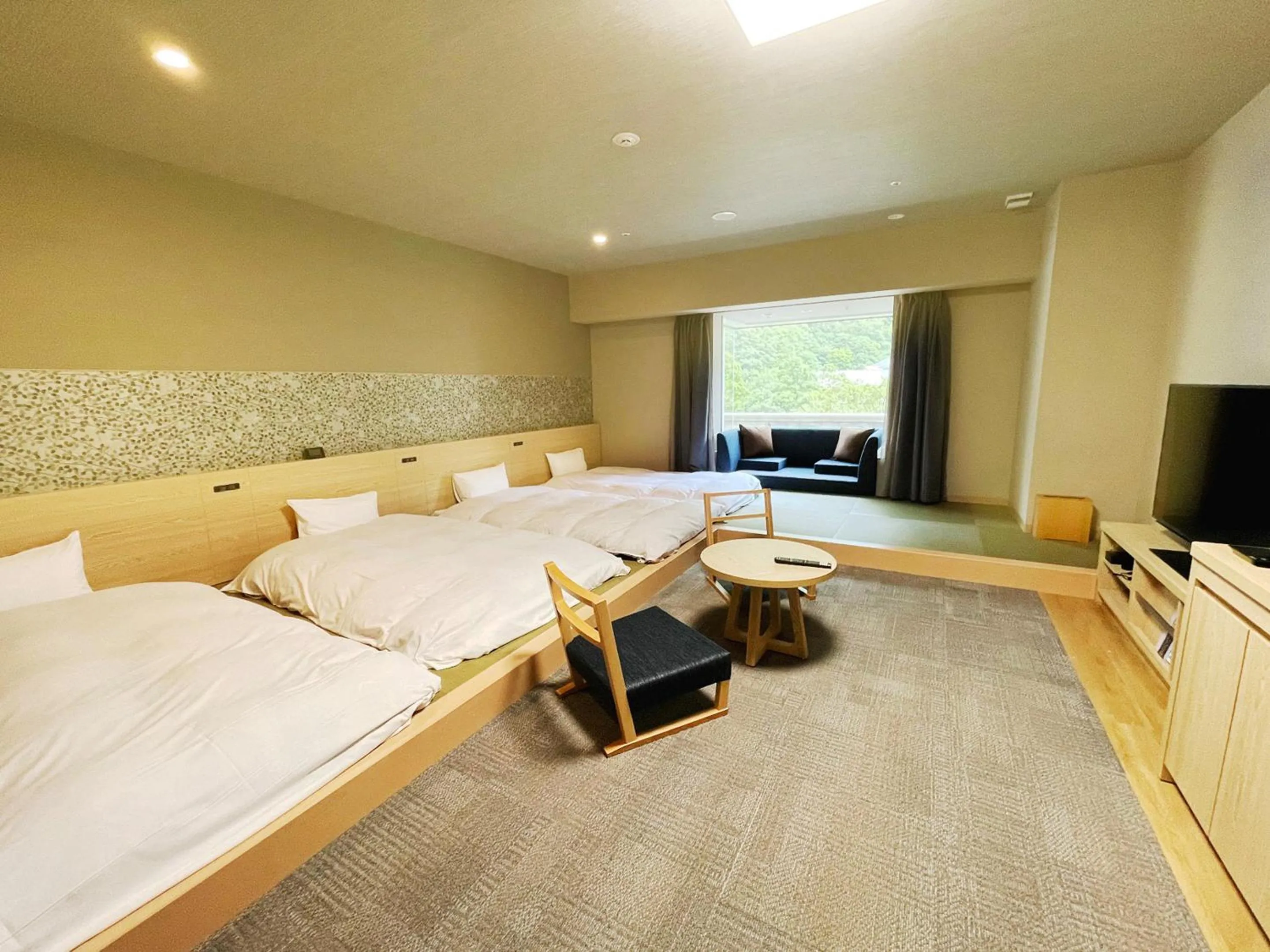 Photo of the whole room, Bed in Grandvrio Hotel Unazukionsen