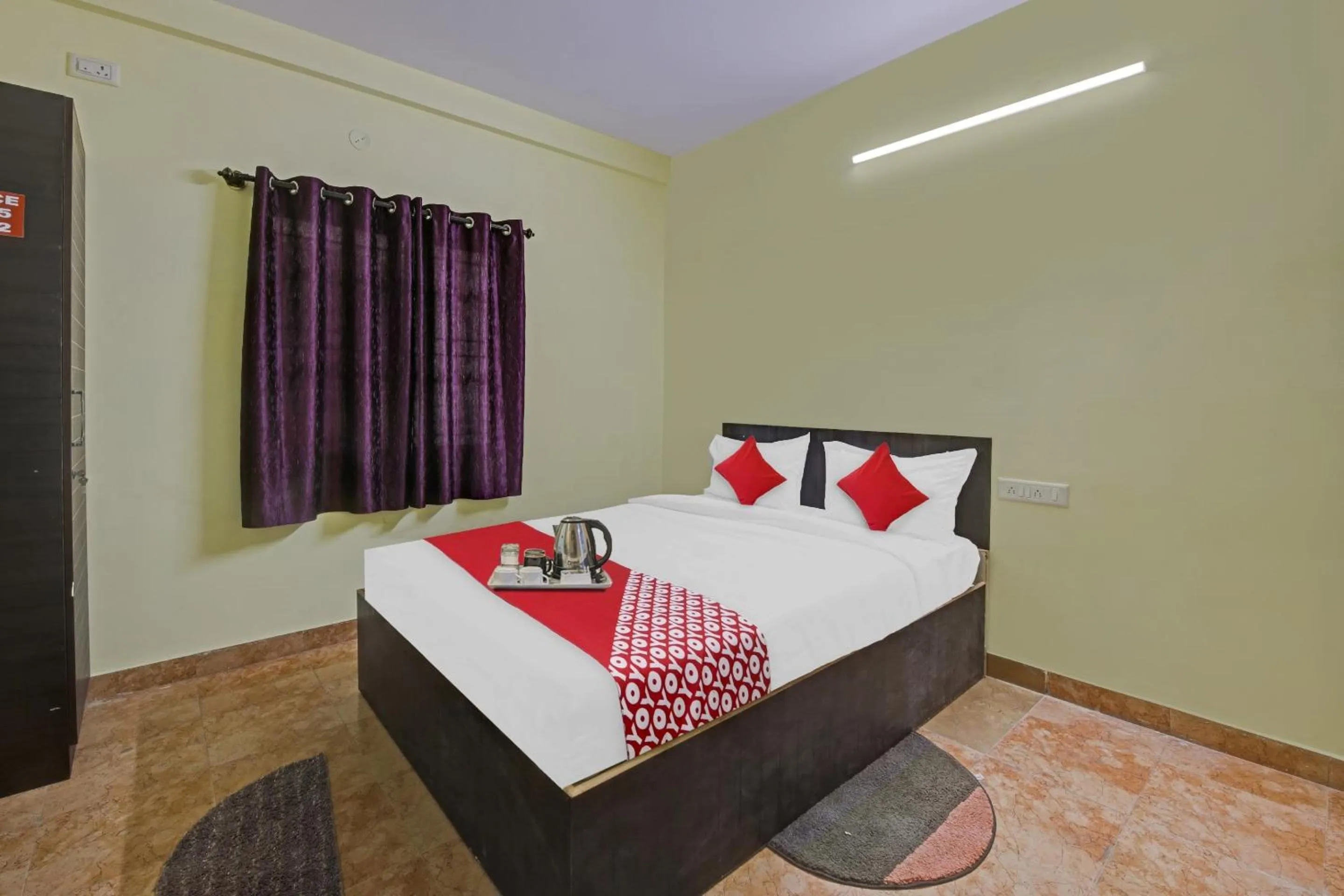 Bedroom in Hotel O Honnagiri Residency