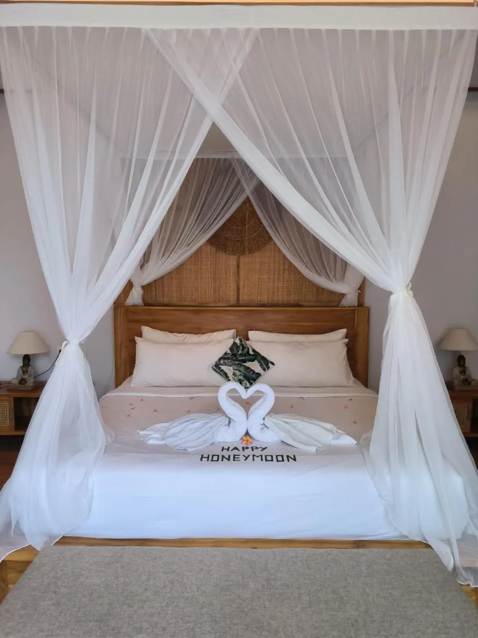 Bed in Sawitri Anandhita Luxury Villas