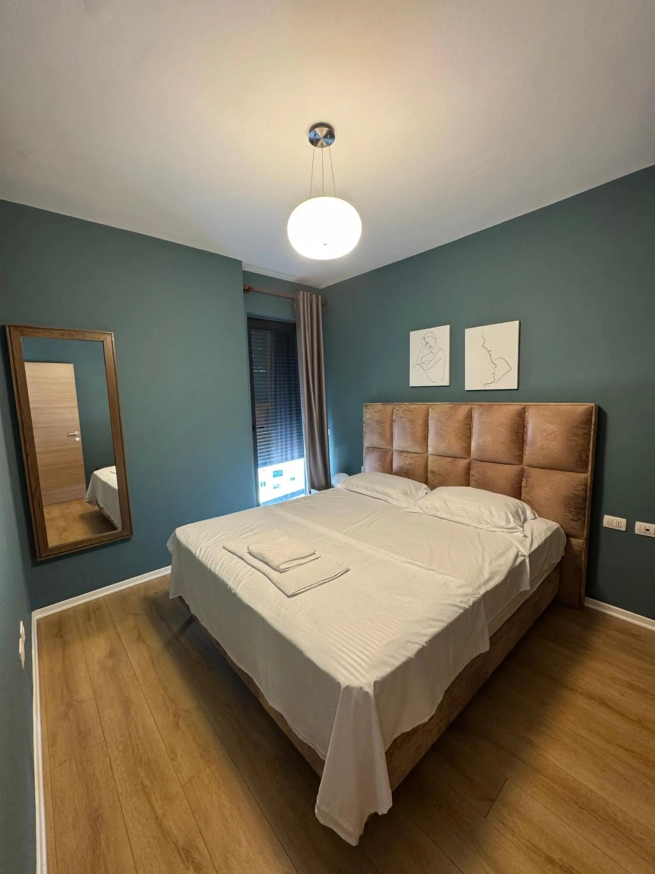 Bed in Kalpazo Home Tirana 21