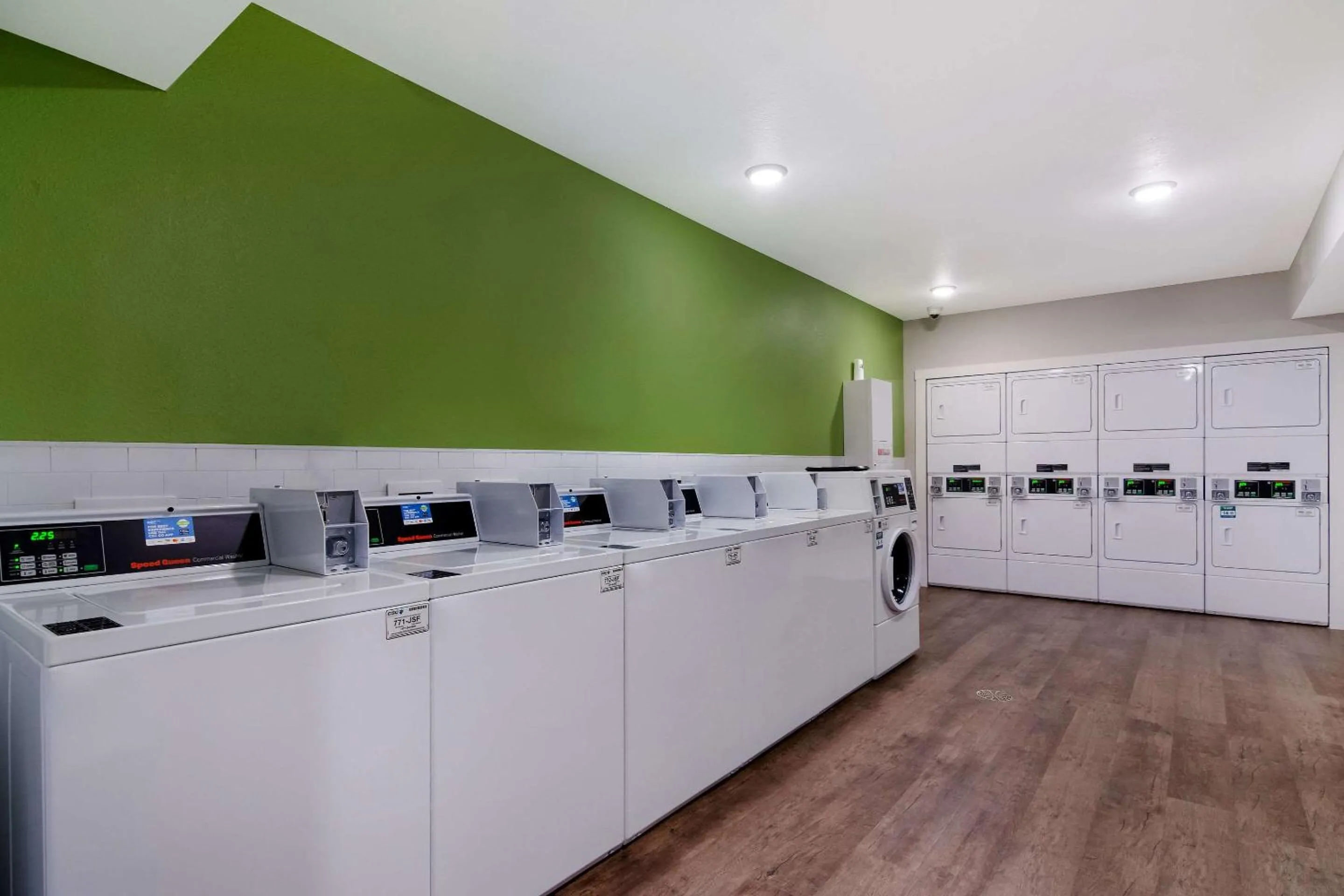 laundry in WoodSpring Suites Morrisville - Raleigh Durham Airport