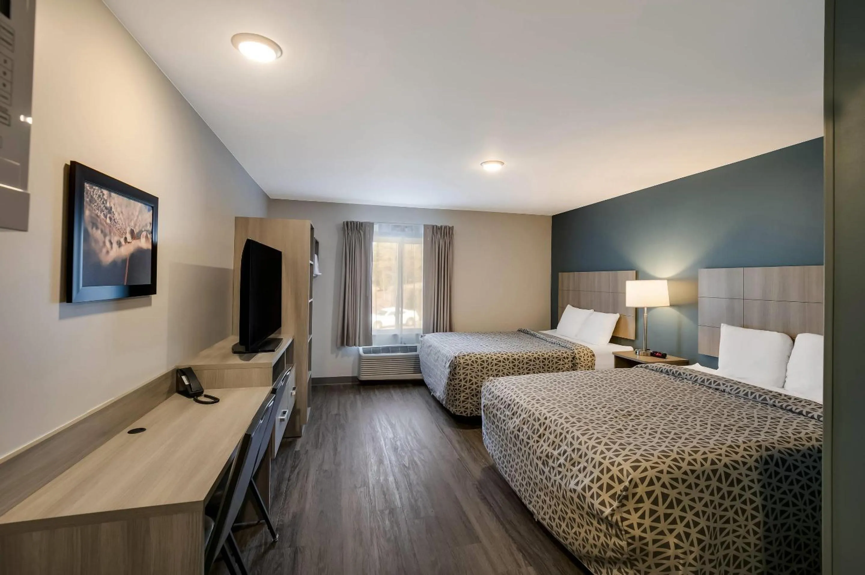 Bedroom, Bed in WoodSpring Suites Knoxville West