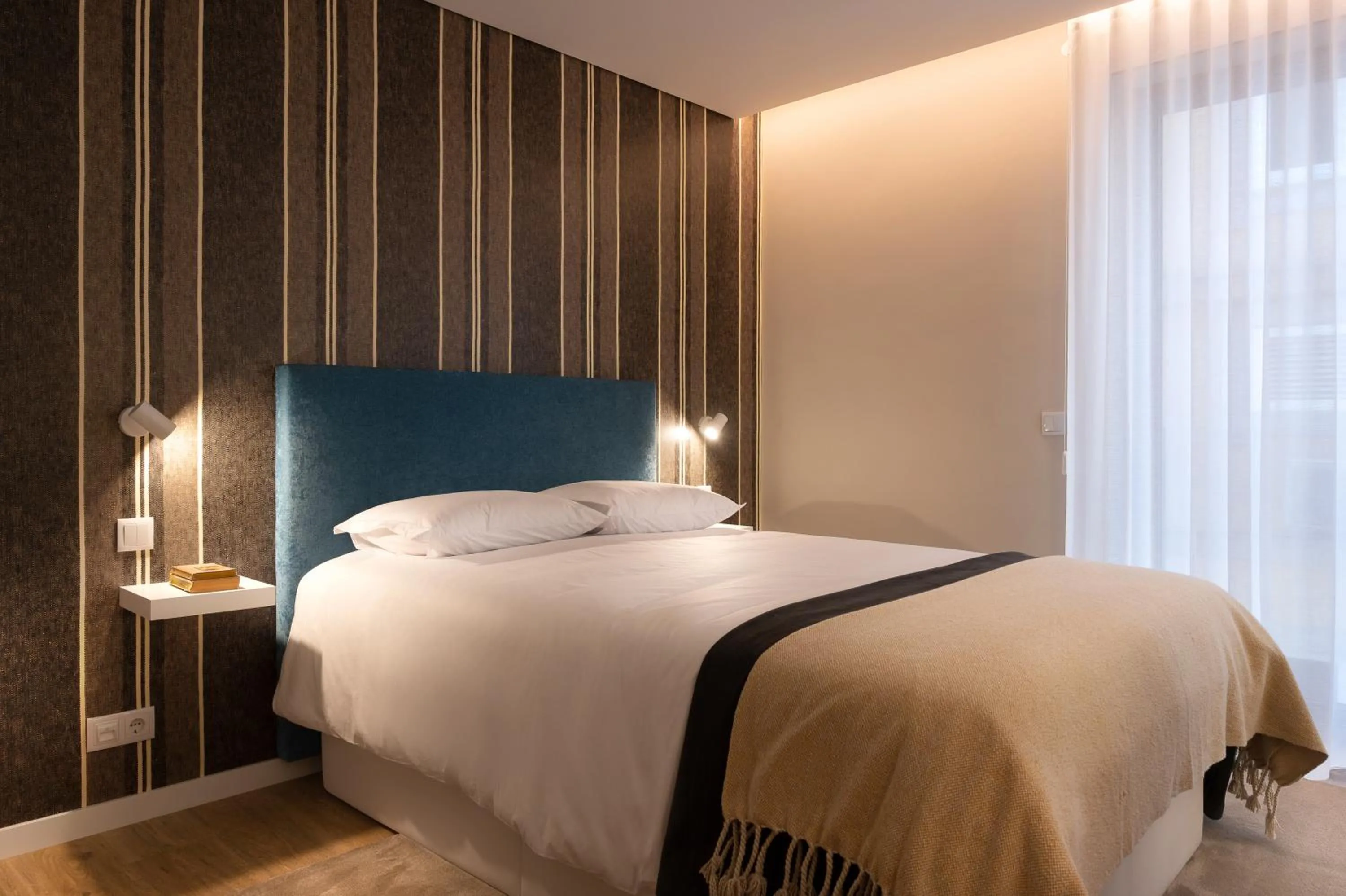 Bed in Wanderlust, by Bolhão Residences