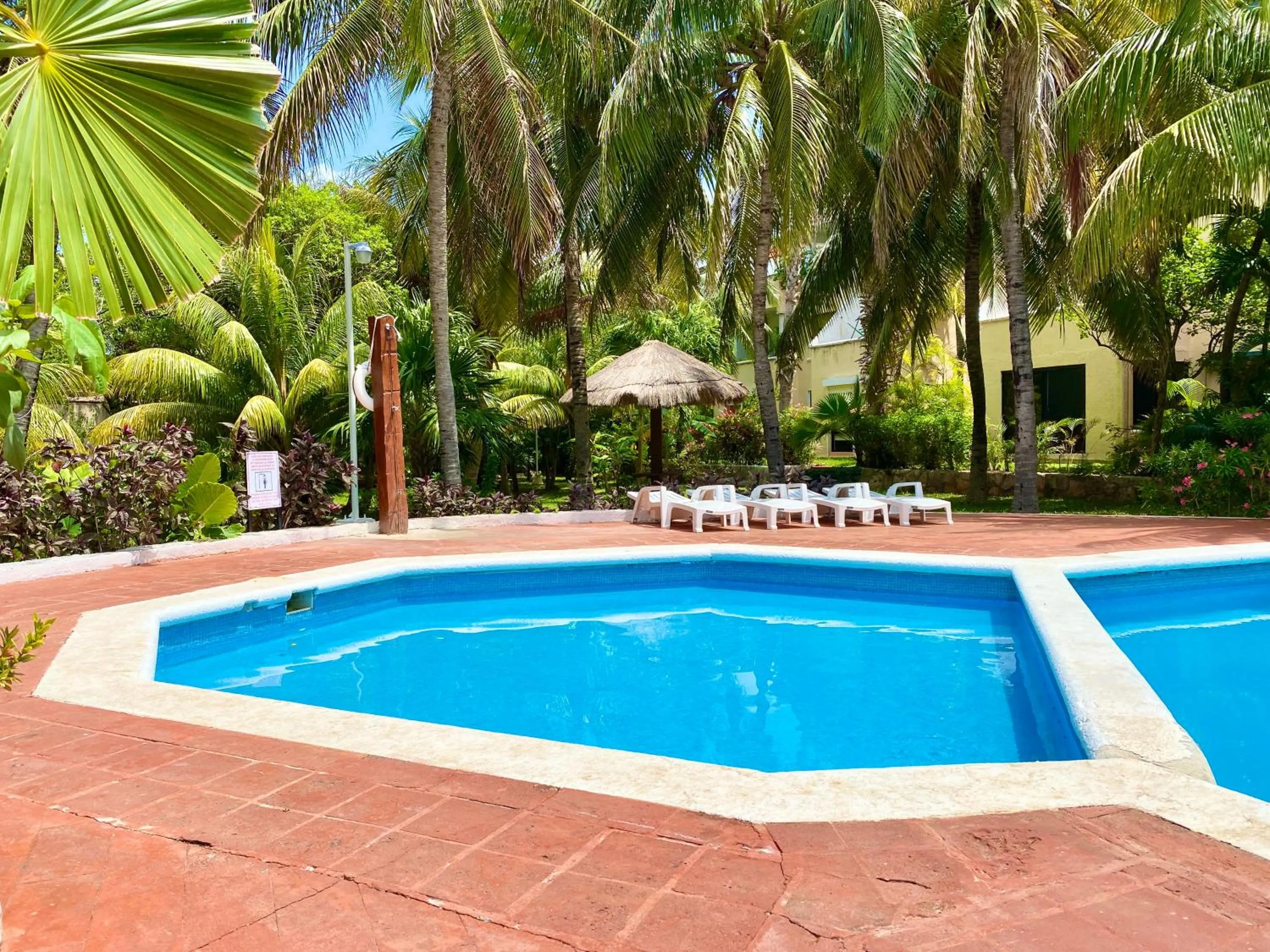 Swimming pool in Villas Tropical By Andiani